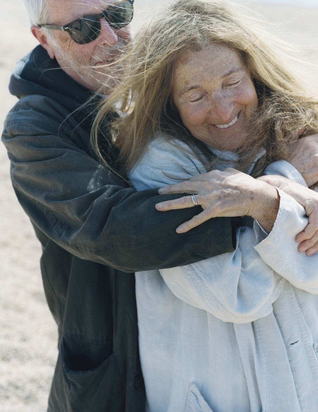 Terry and Tricia Jones, founders of i-D Magazine, photographed by Oliver Hadlee Pearch on Camber Sands.