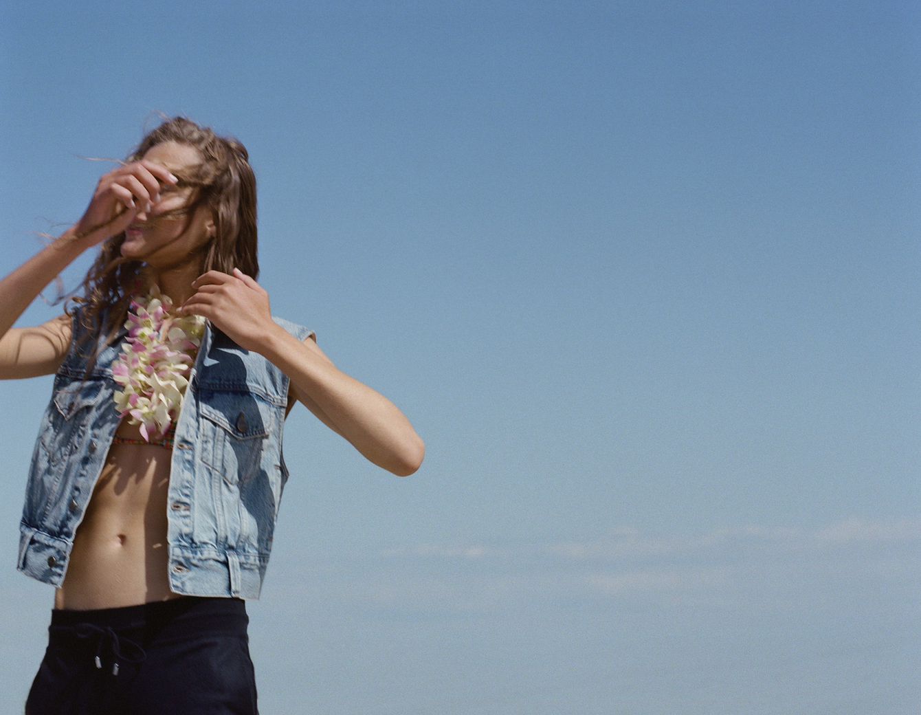 Angelina on the beach in Long Island photographed by Theo Wenner.