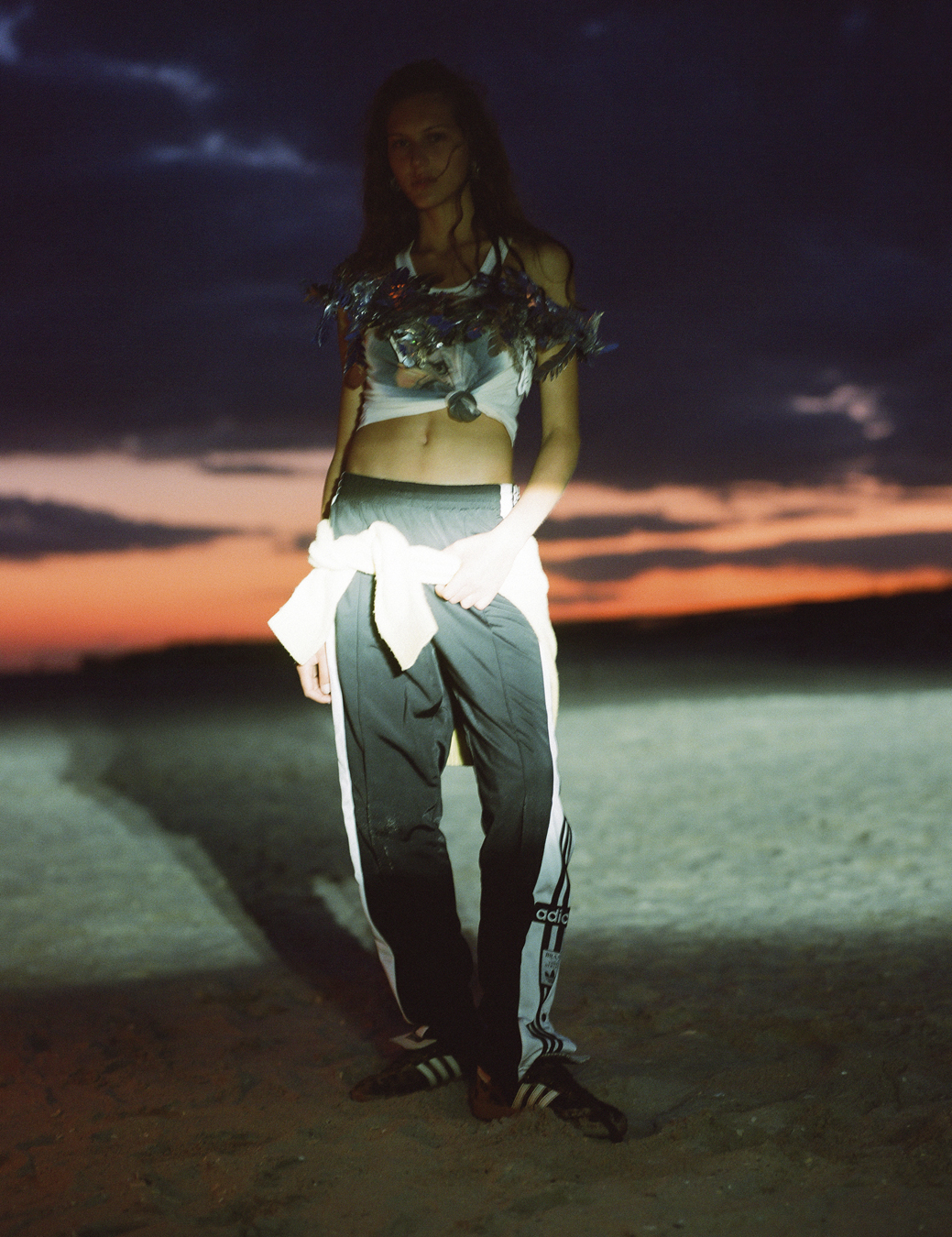 Angelina on the beach in Long Island photographed by Theo Wenner.