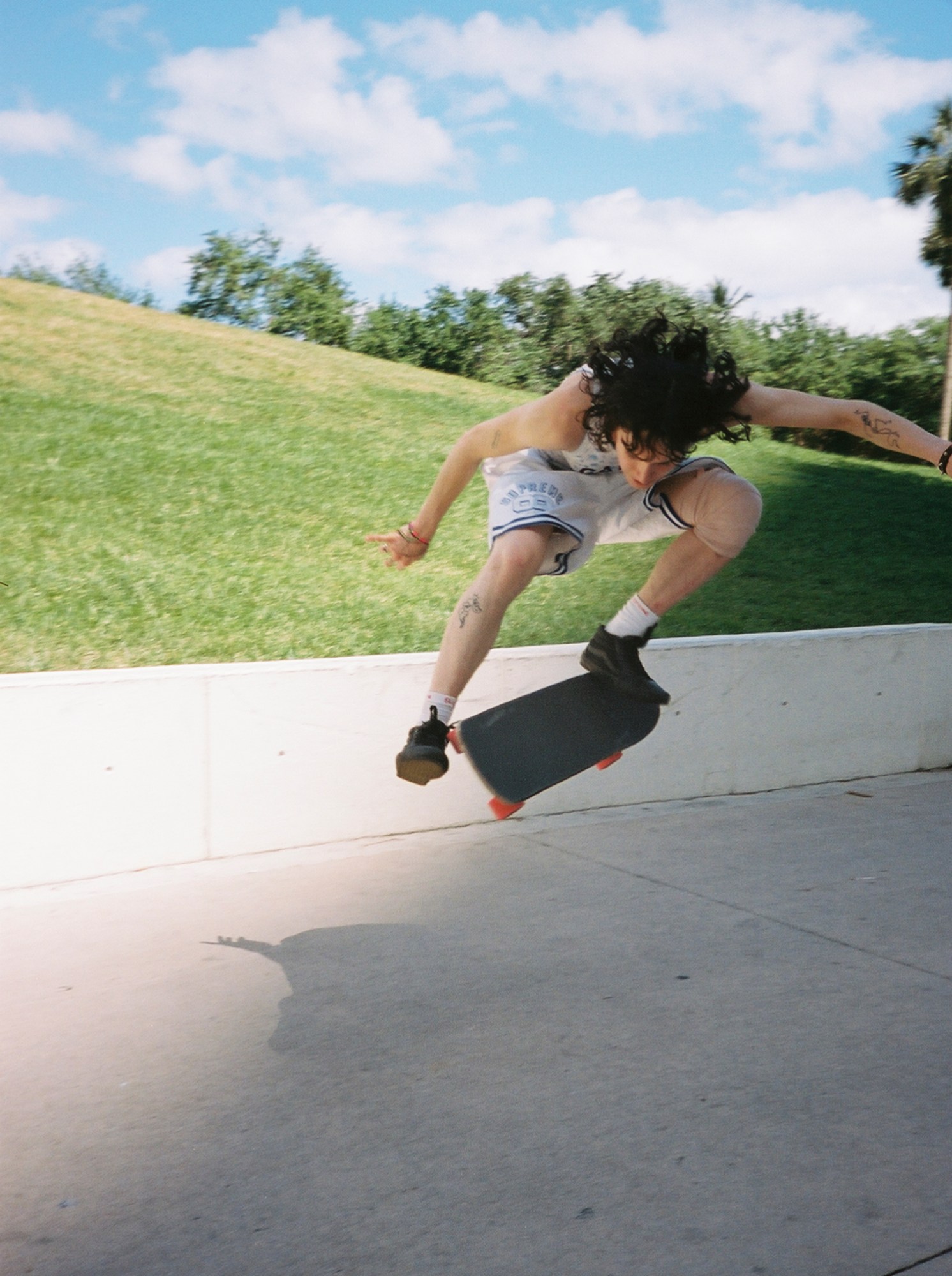 Violet skate crew photographed by Sandy Kim in Miami.