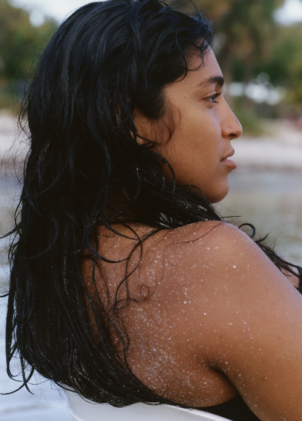 Nouri photographed on the beach by Laura Jane Coulson in Miami.