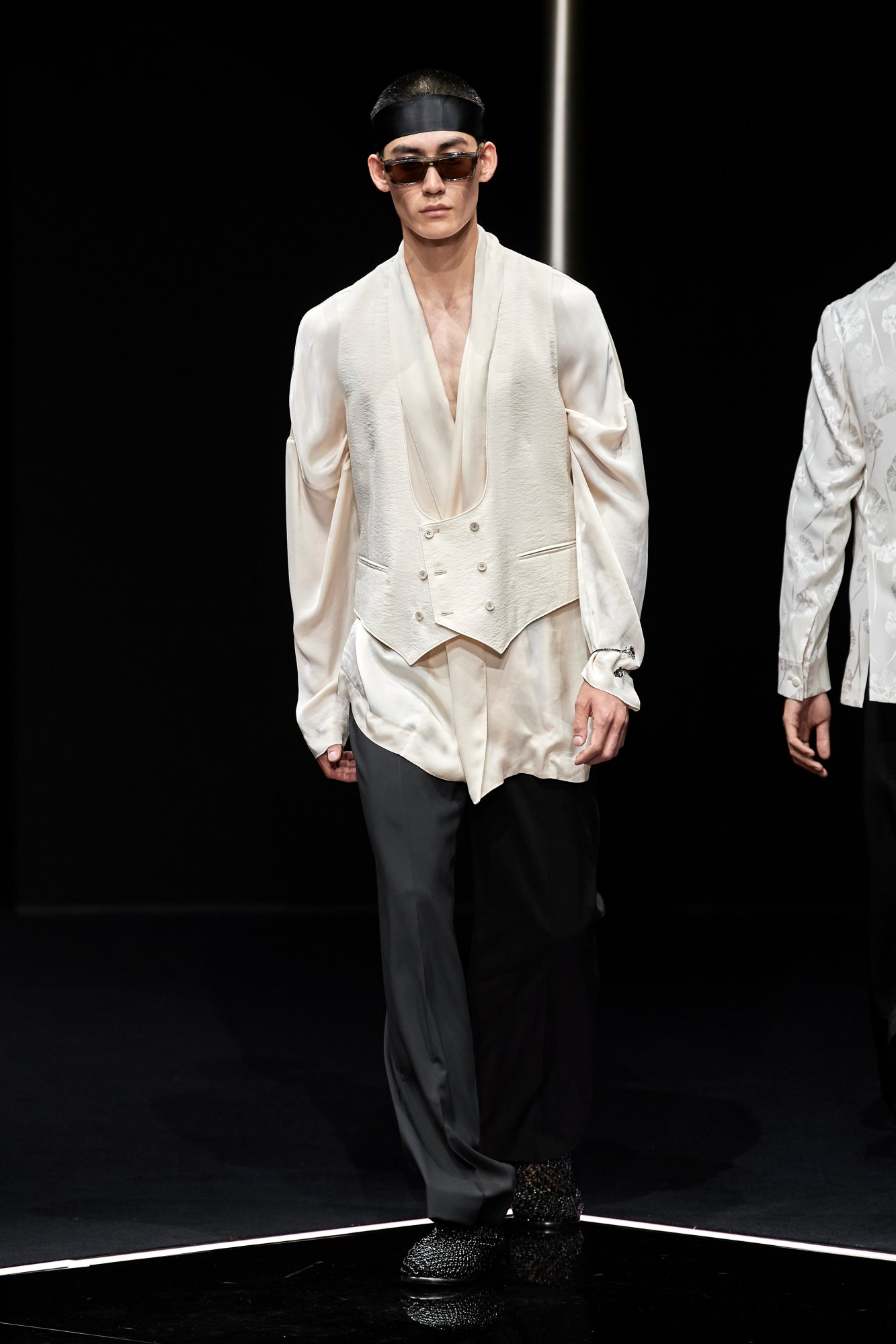 Model walking for Emporio Armani SS24 Men's. Image via Spotlight