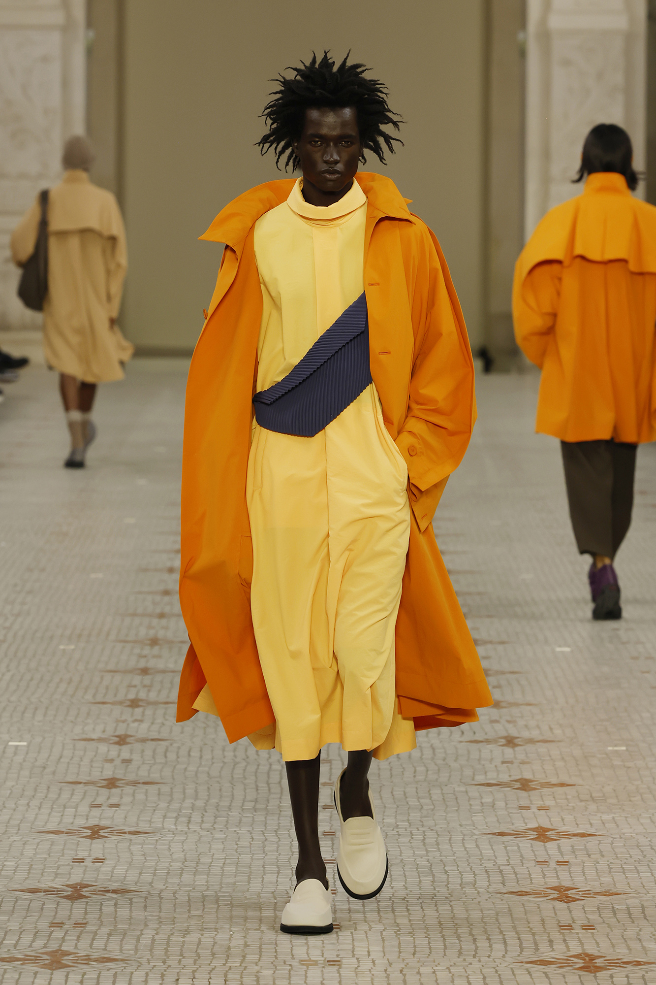 Model walking for Homme Plissé Issey Miyake at Paris Fashion Week Men's SS24