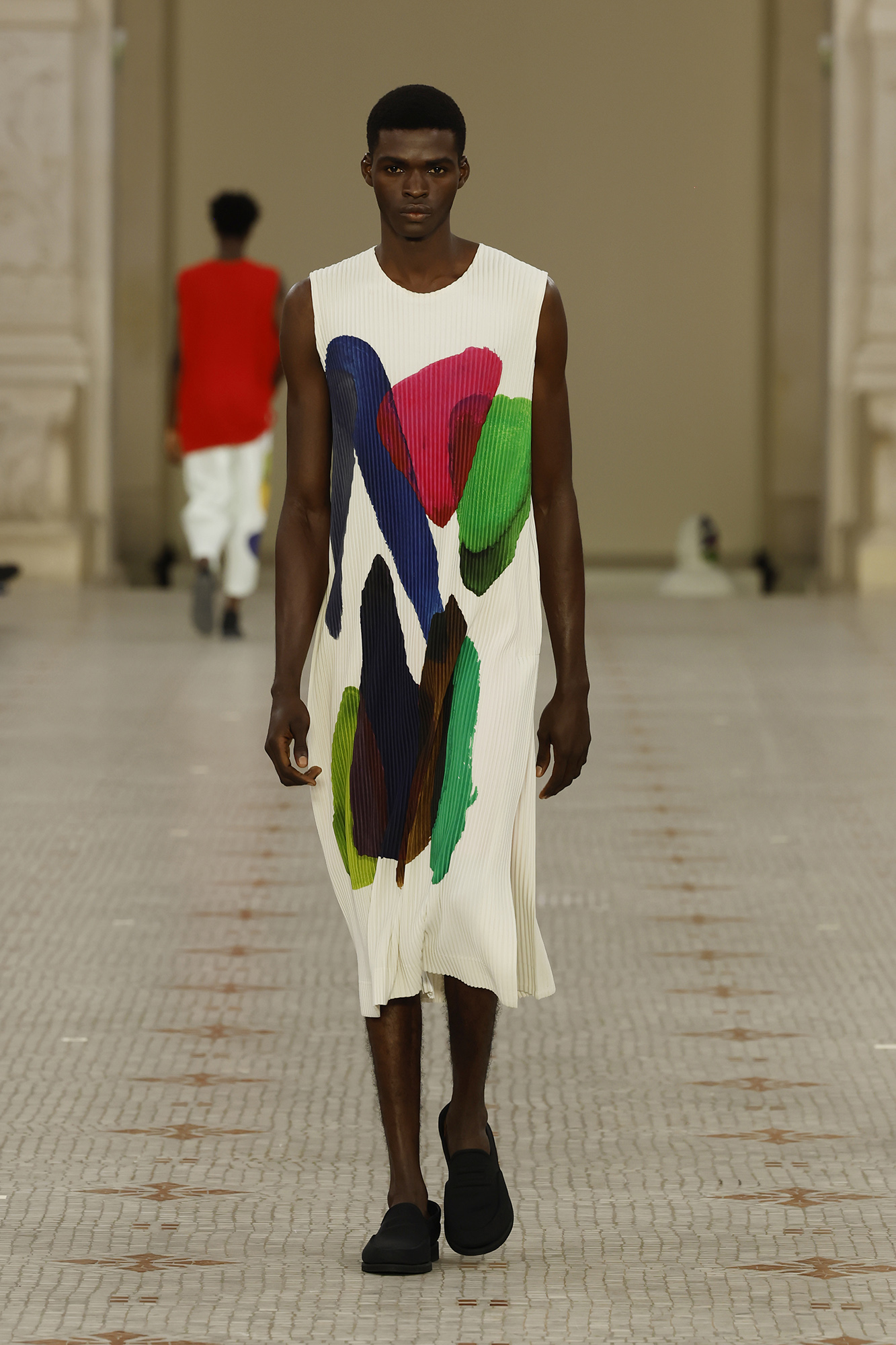 Model walking for Homme Plissé Issey Miyake at Paris Fashion Week Men's SS24