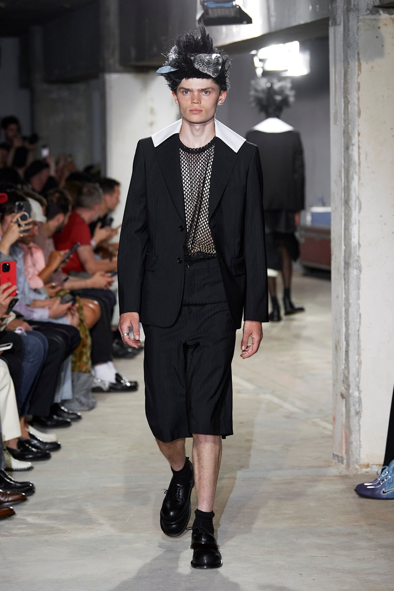 Model walking for Comme Des Garçons at Paris Fashion Week Men's SS24