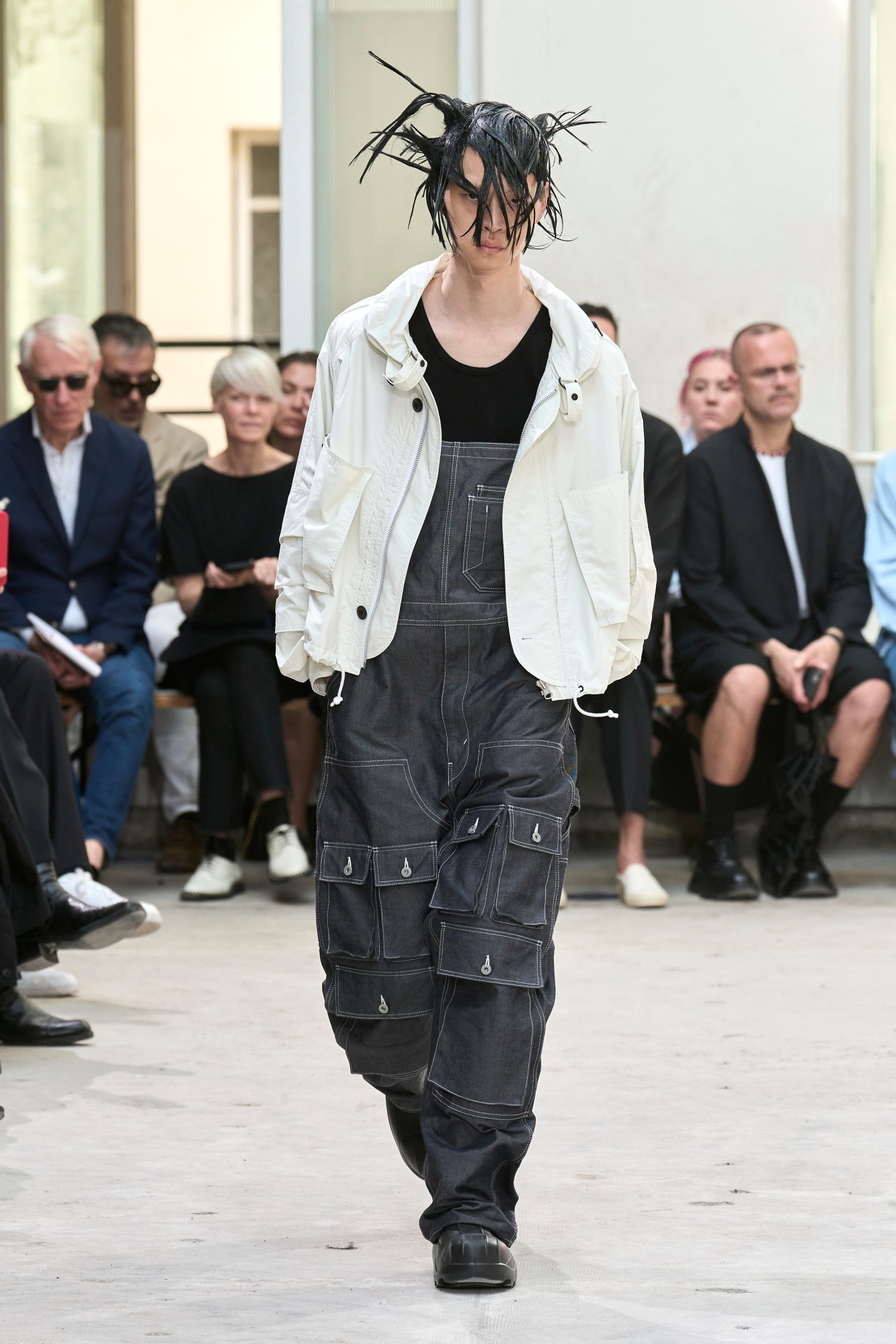 Model walking for Junya Watanabe at Paris Fashion Week Men's SS24