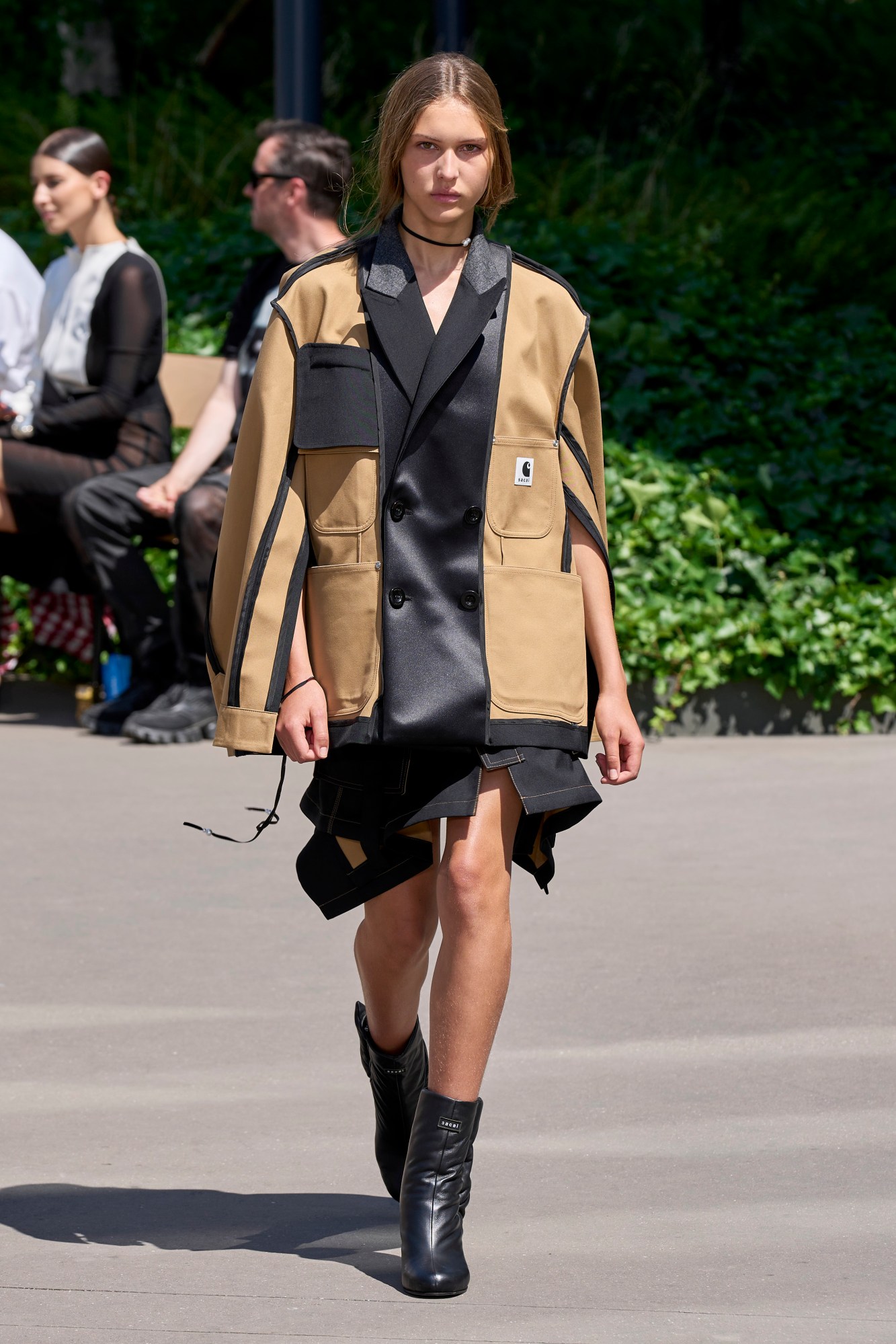 Model walking for Sacai at Paris Fashion Week Men's SS24