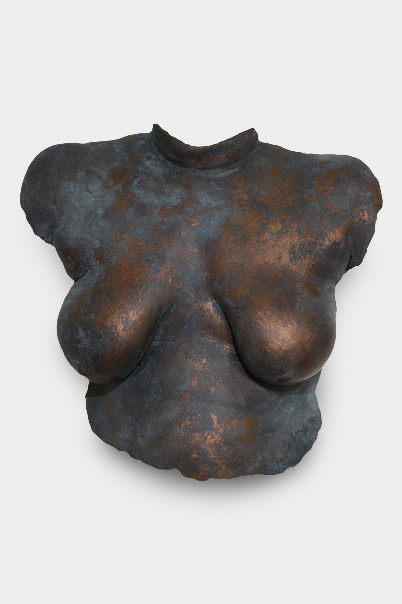 a bronze molding of a woman's body