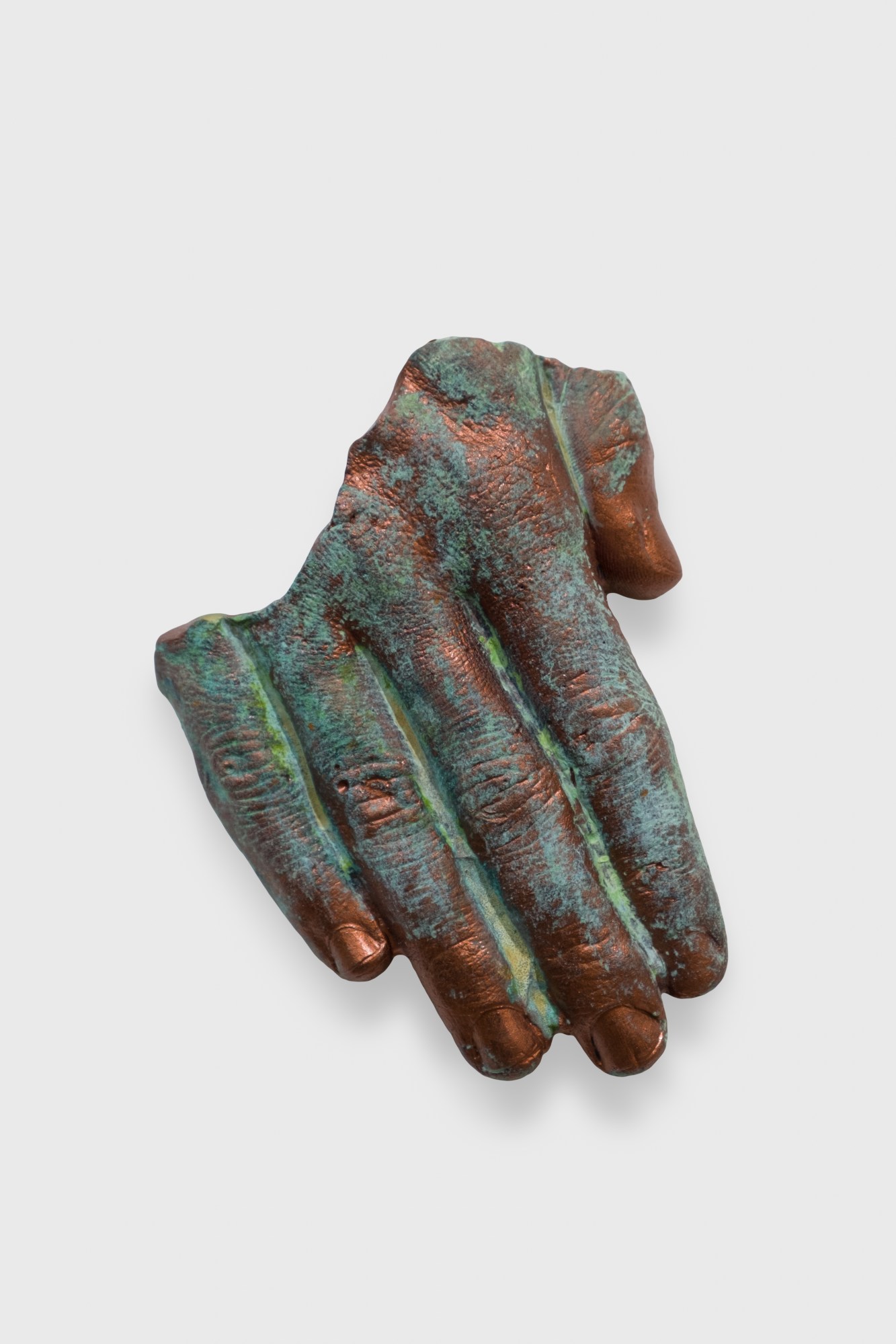 a copper molding of a hand