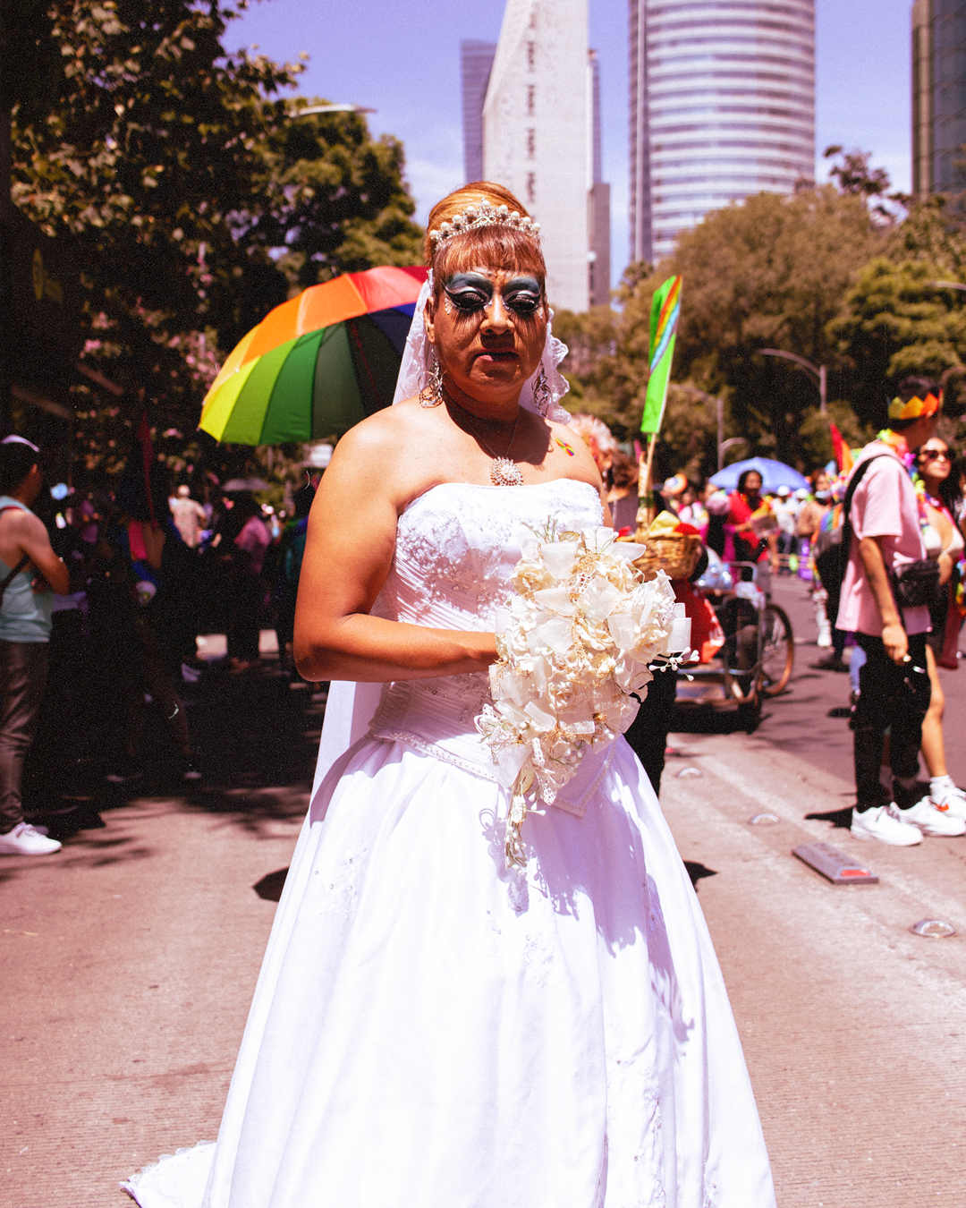 a man wears a wedding dress at mexico city pride