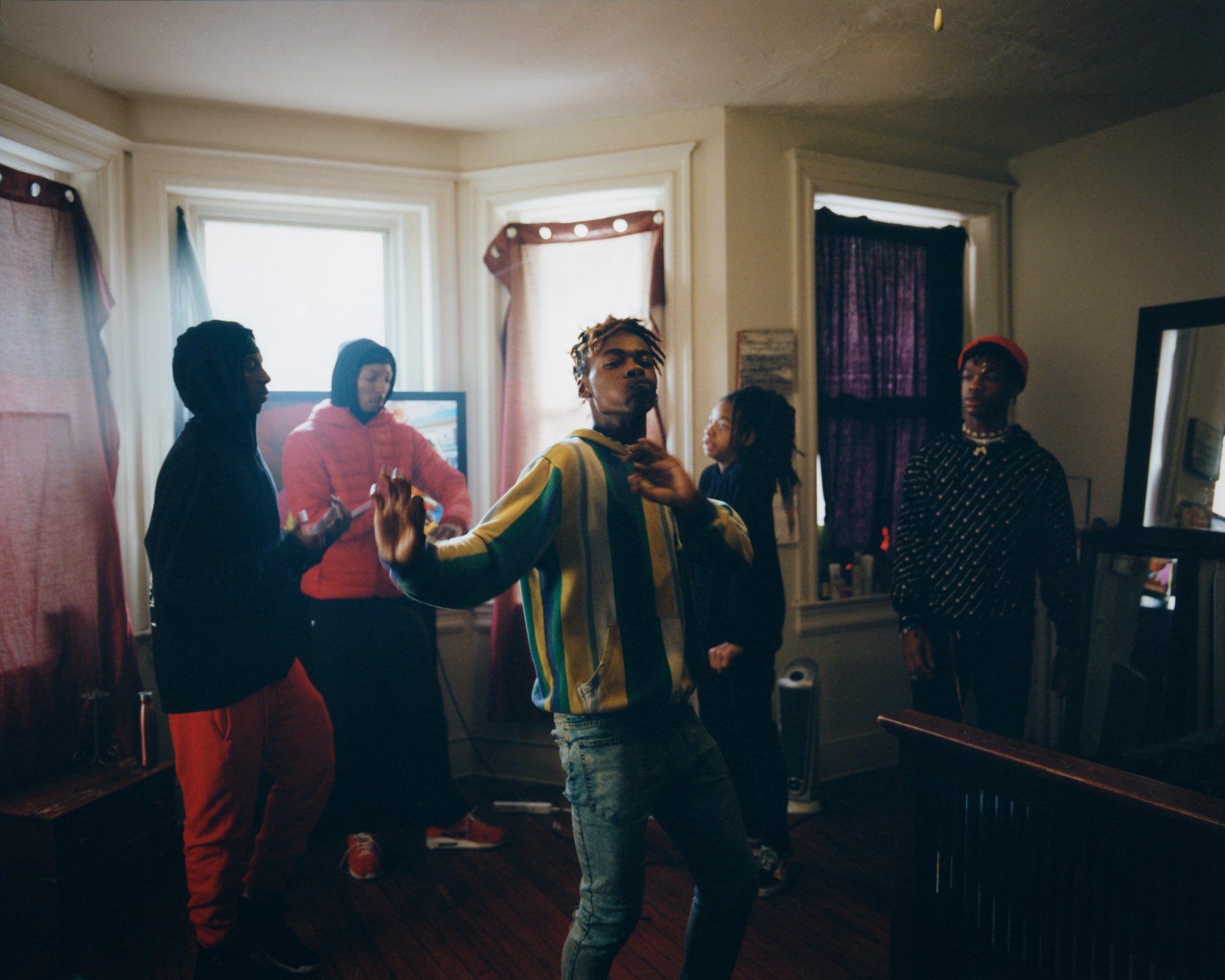 a beat-ya-feet dance crew in dc dancing in a parking lot photographed by Nate Langston Palmer