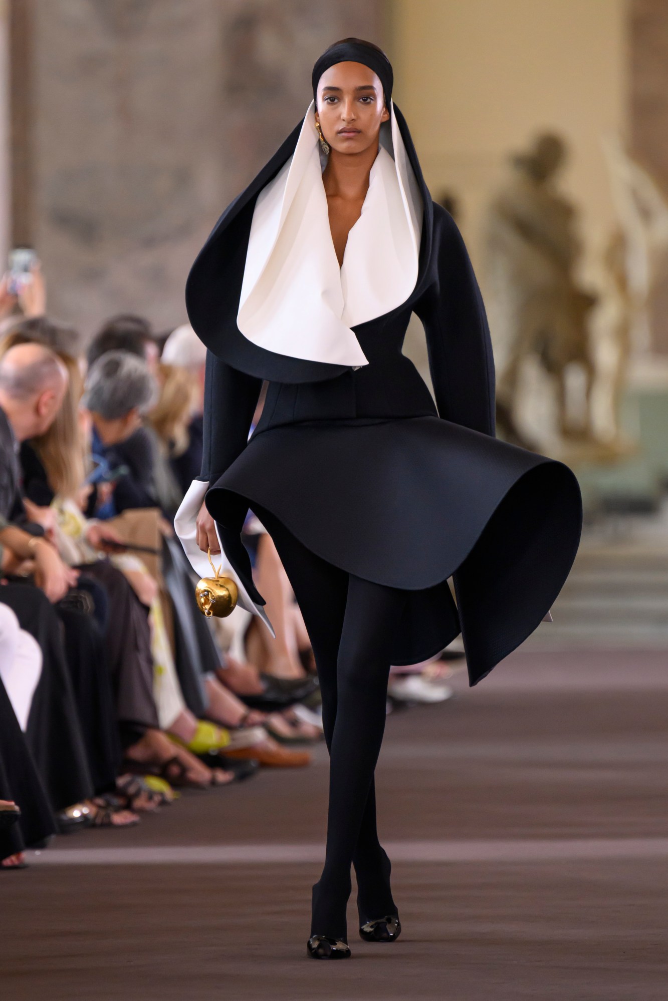 Model wearing Schiaparelli at Haute Couture Fashion Week AW23 in Paris. Image from Spotlight.