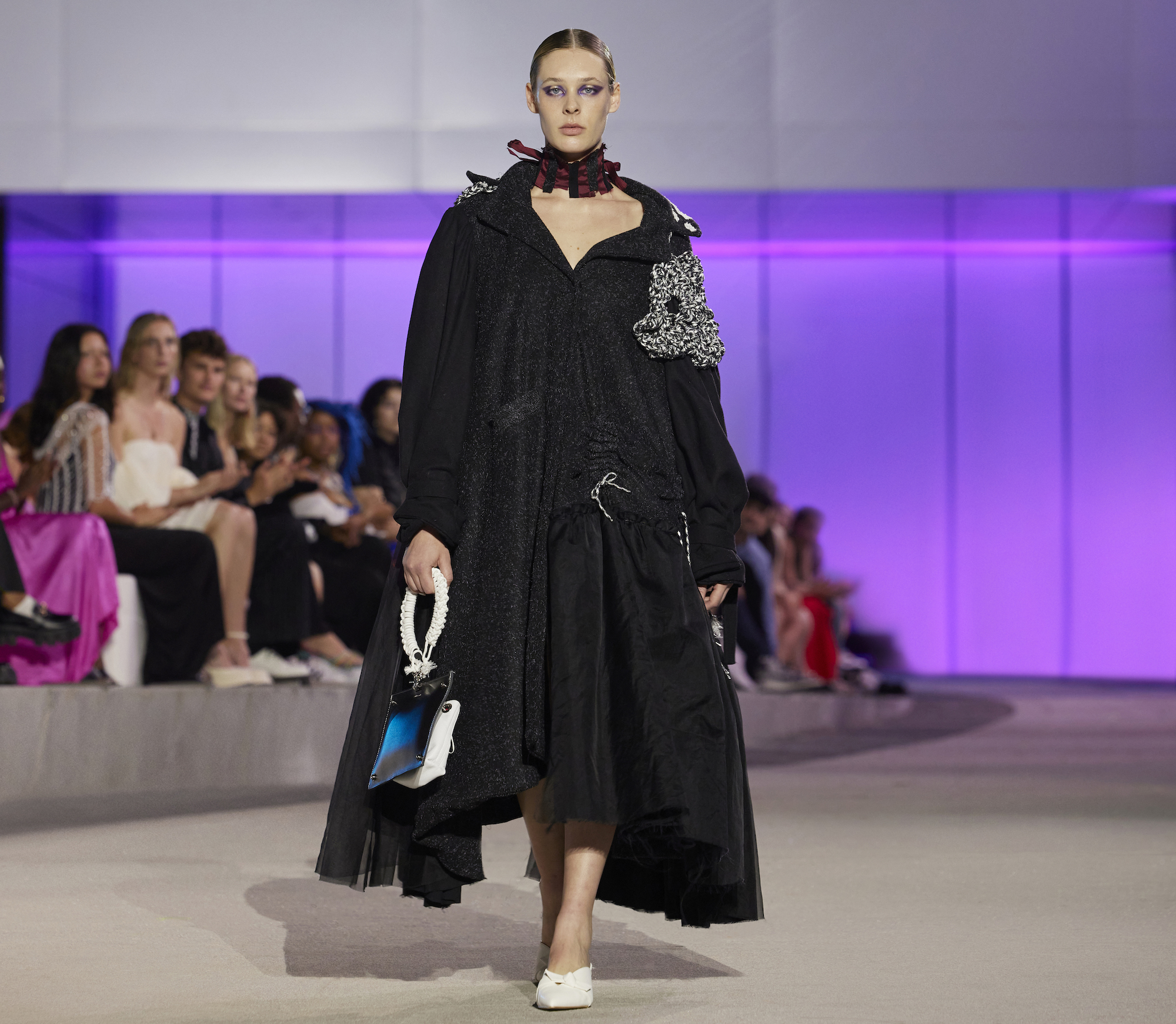 a model wearing Anyssa Merlini's scad 2023 graduate collection