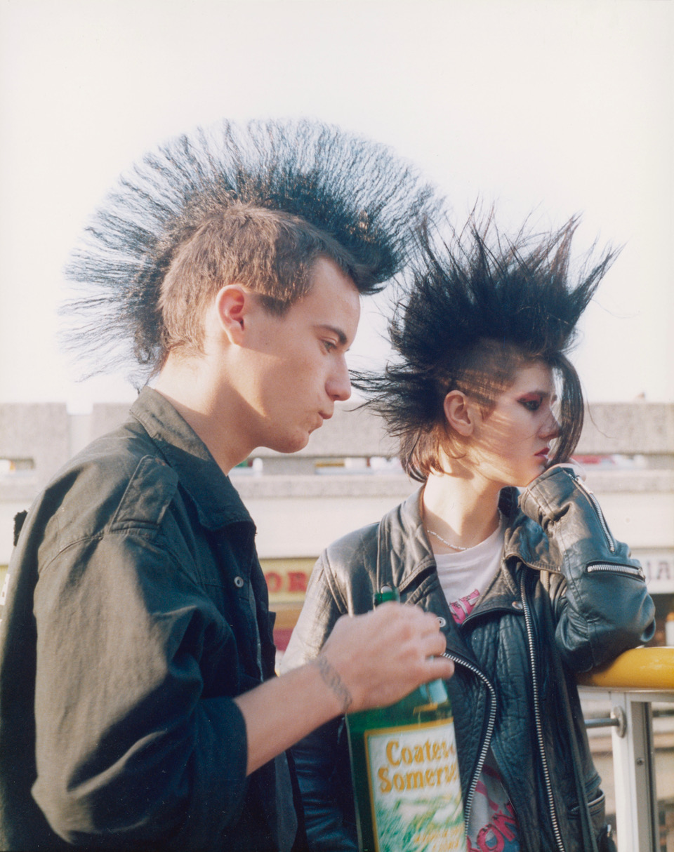 two young punks with black mohawks drinking somerset cider