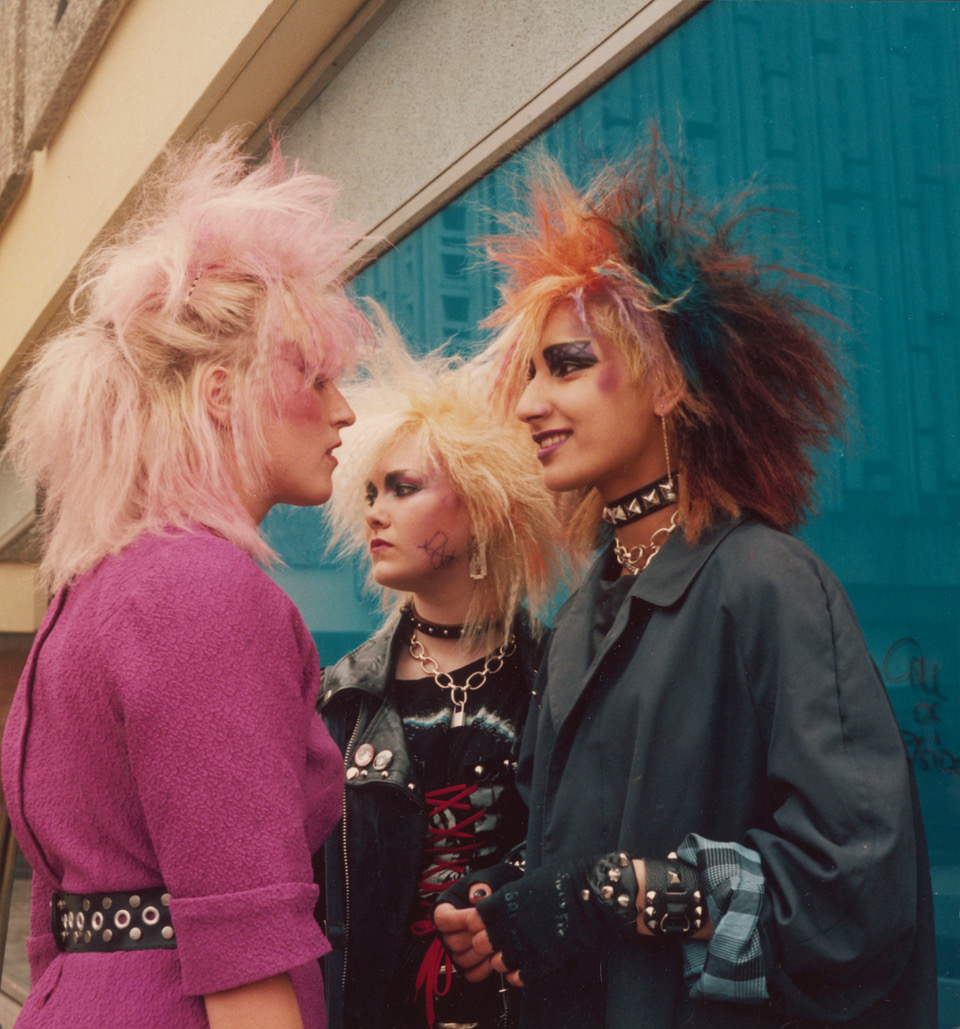 three young punk girls with colourful mohawk hair