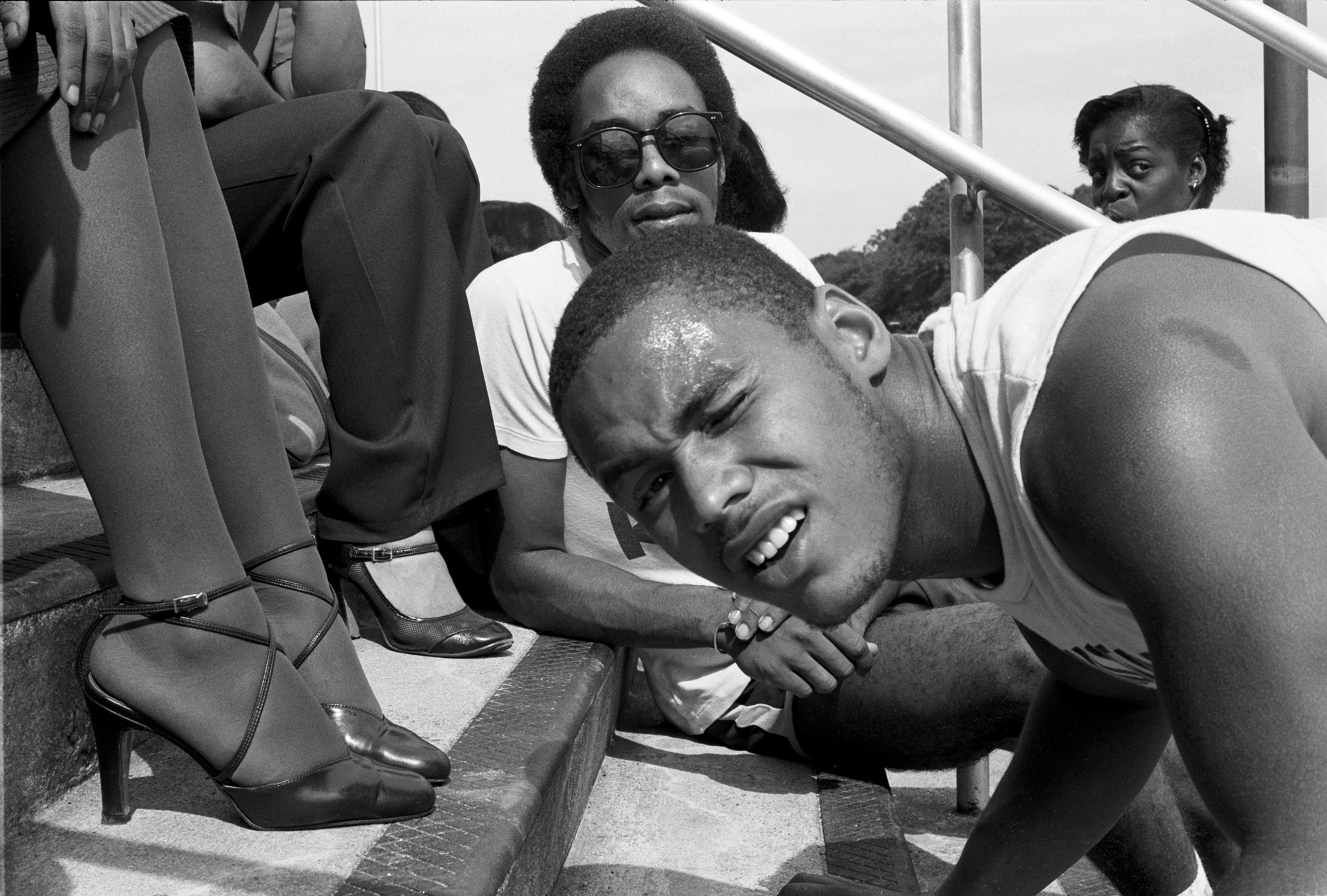 high heels and students messing around on the bleachers in the 70s