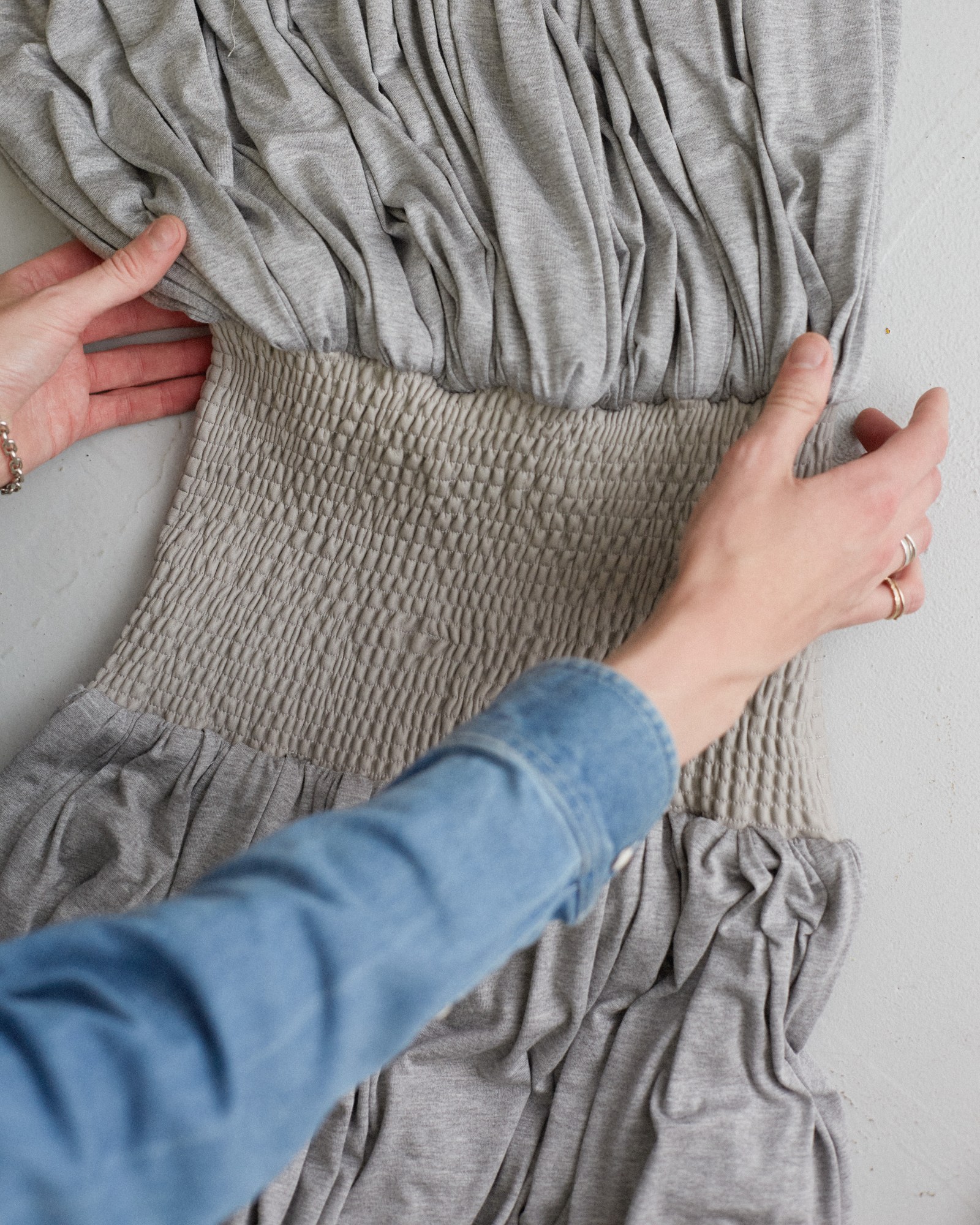 a shirred waist dress in gray jersey