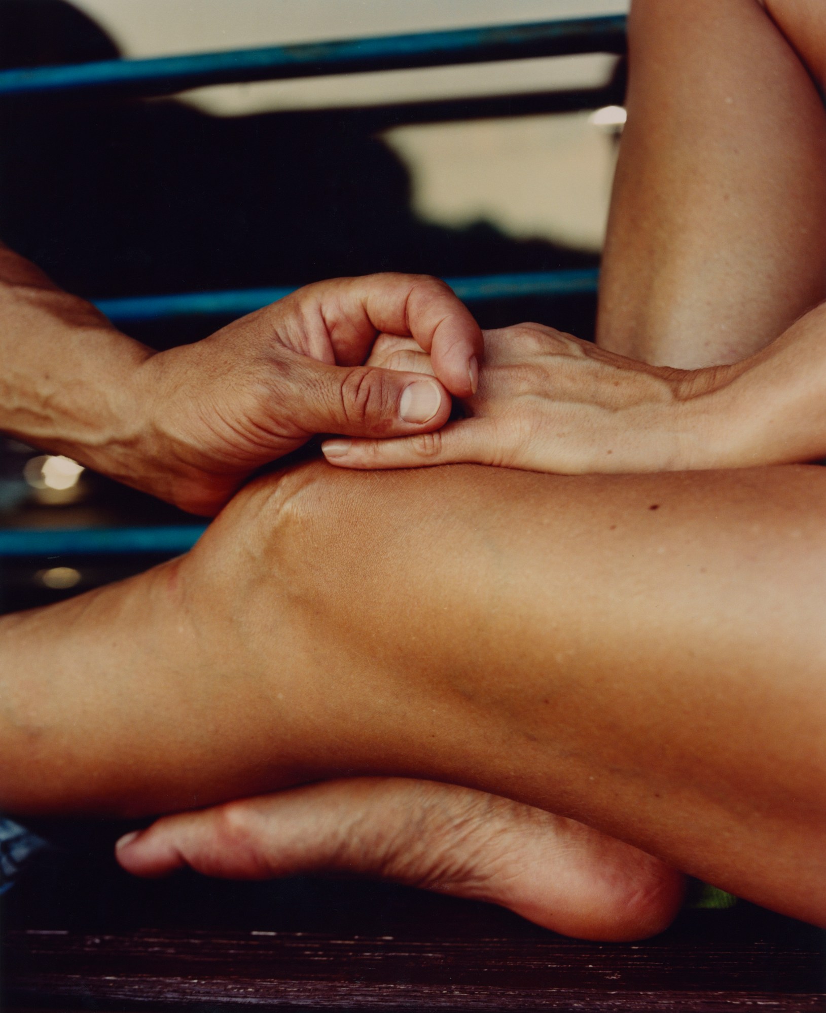 hands holding on a woman's knee