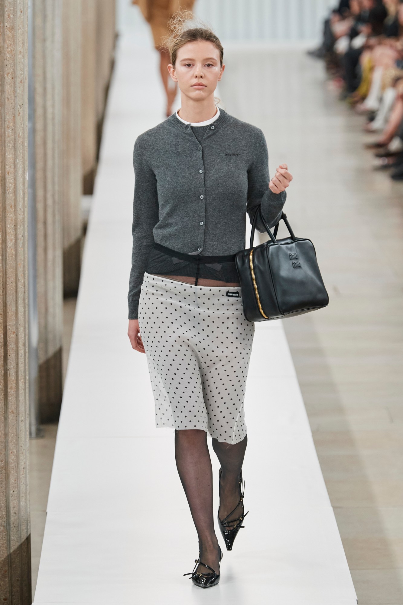 Mia Goth walking the runway for Miu Miu AW23.