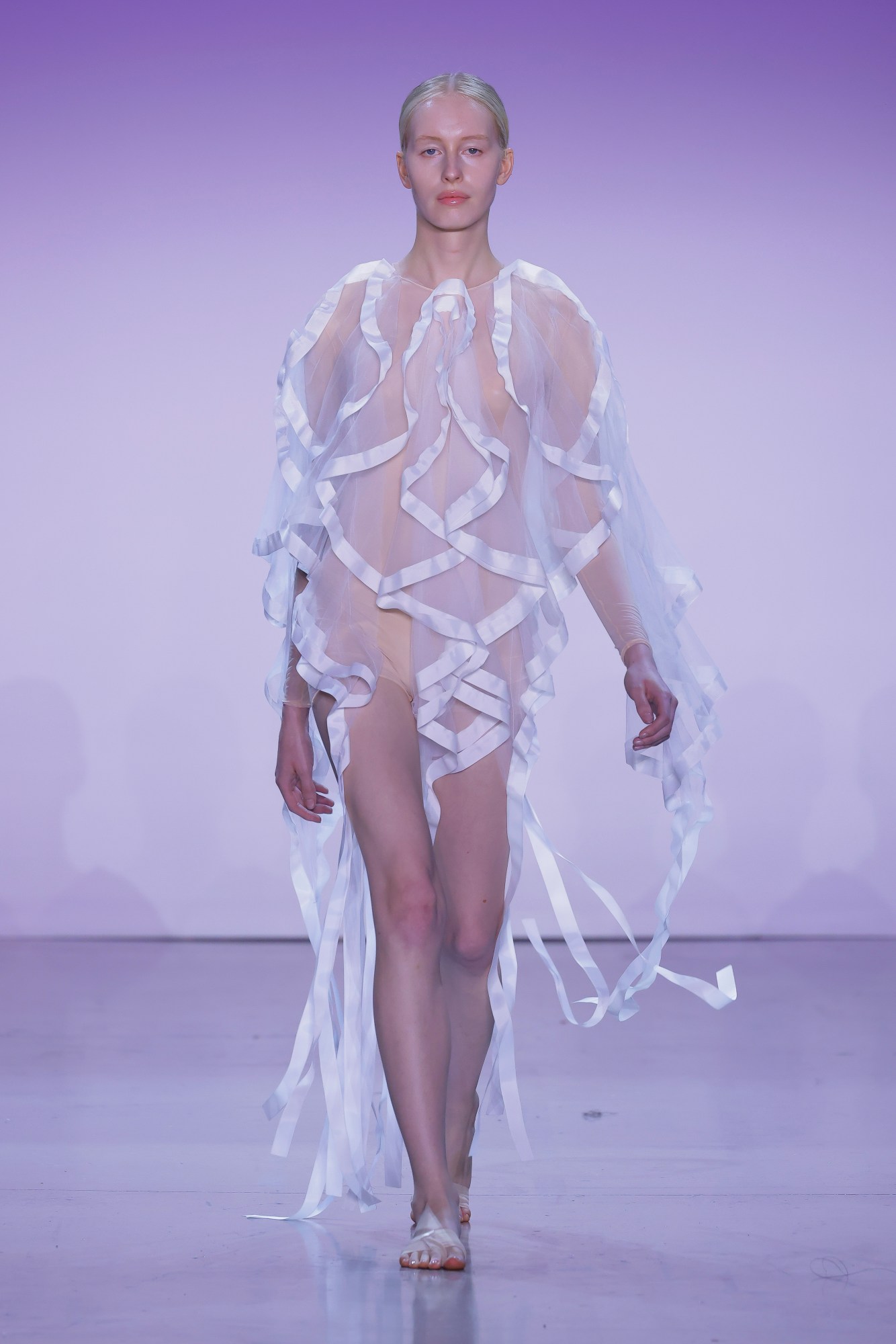 a model wearing deborah won's fit mfa graduate collection