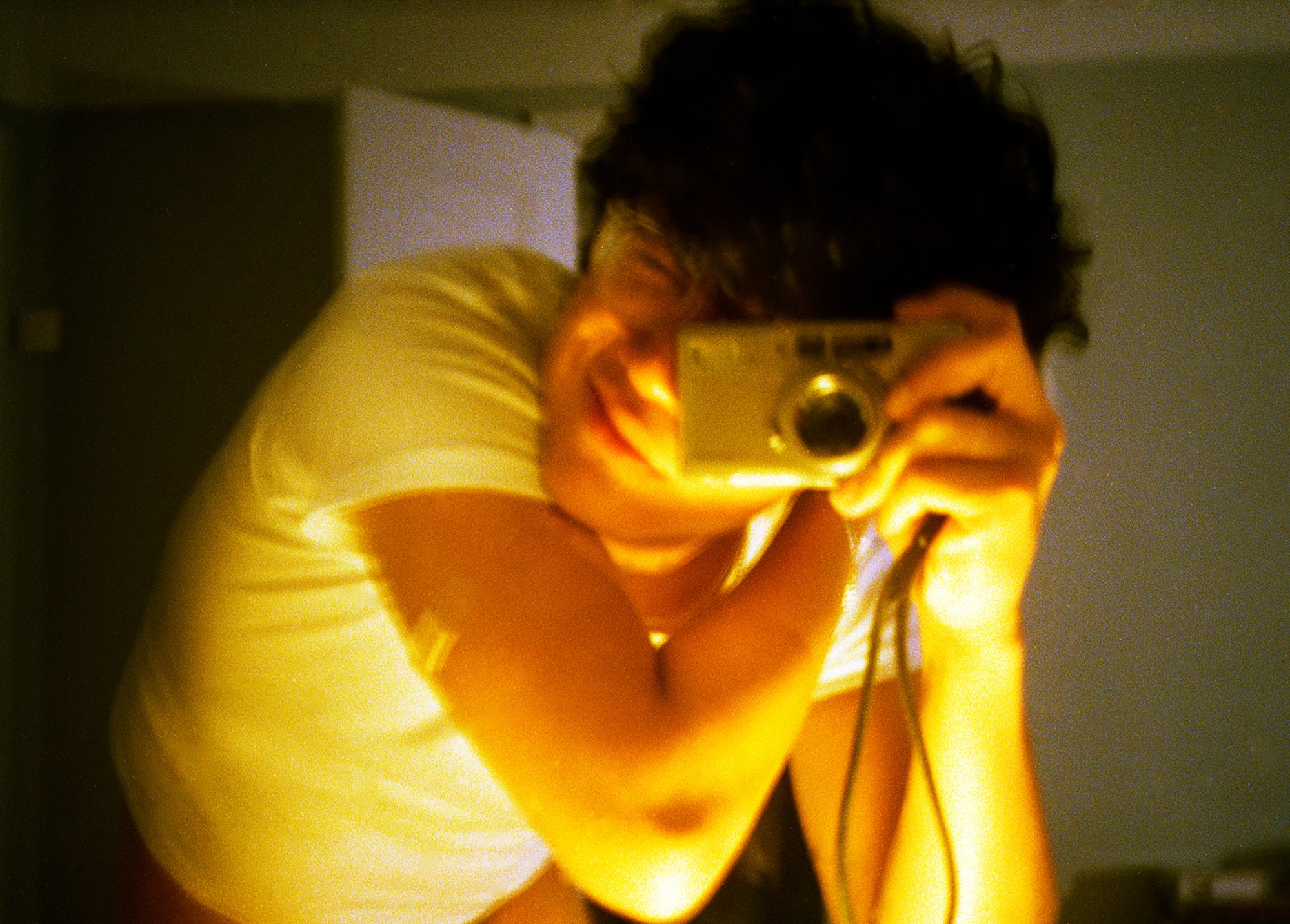 Angelo Capacyachi taking a self portrait in the mirror