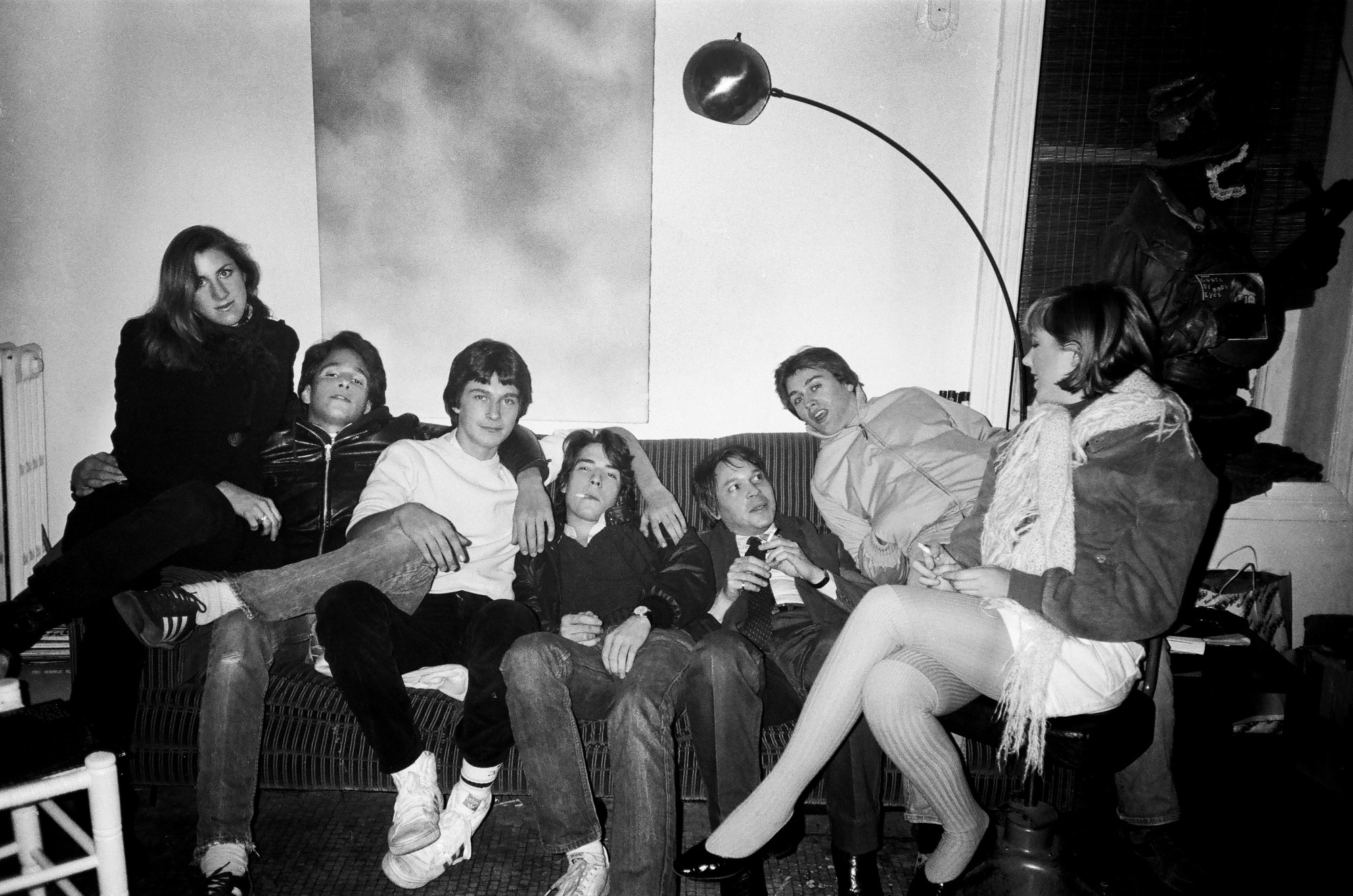 patrick mcmullan photo of a group of friends gathered on a sofa together in new york city