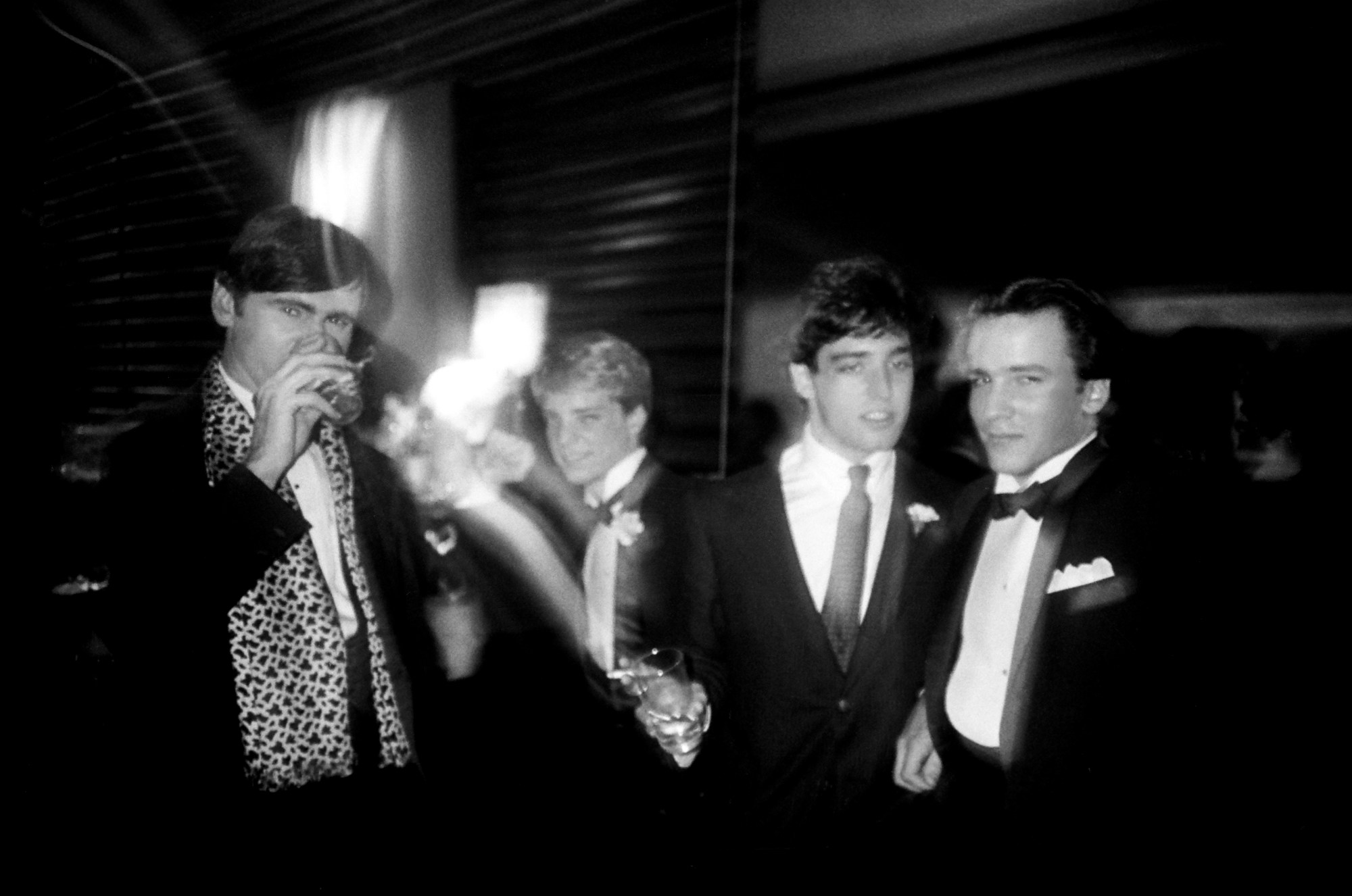 patrick mcmullan photo of Ron Wanless, Ian Falconer, Edwin Meyer and Tom Ford all wearing tuxedos at a party