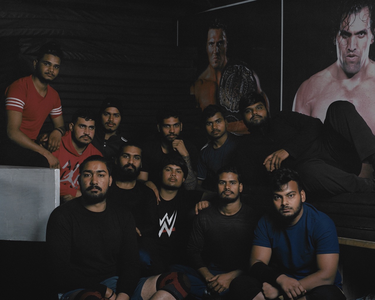 a group of wrestling students at the great khali's wrestling academy