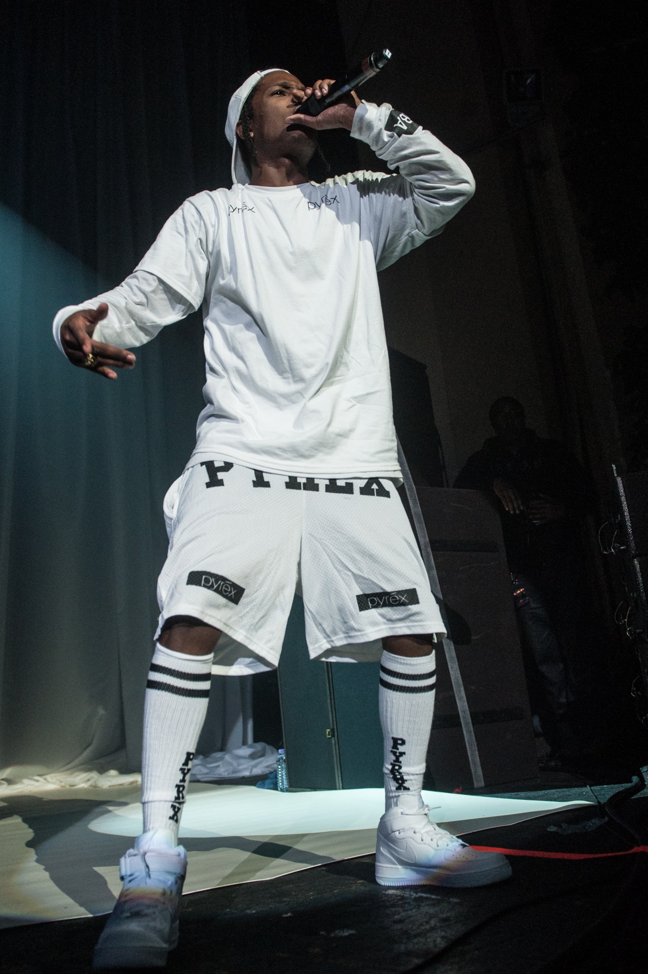 A$AP Rocky wearing health goth while performing on stage at the Brixton Academy in London in 2013