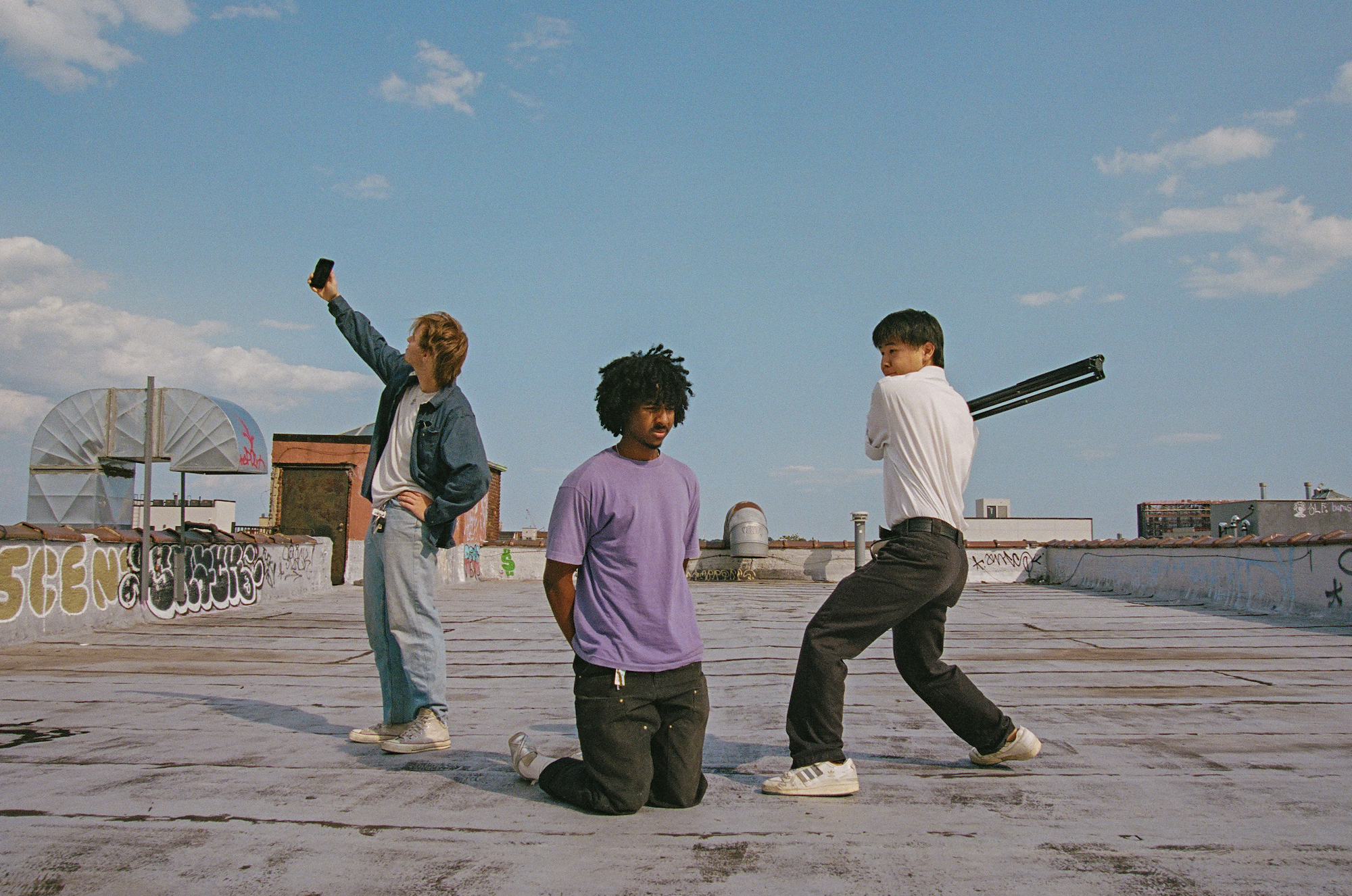 alex sovoda leeban farah and chet oshima on their roof in brooklyn by jacob consenstein