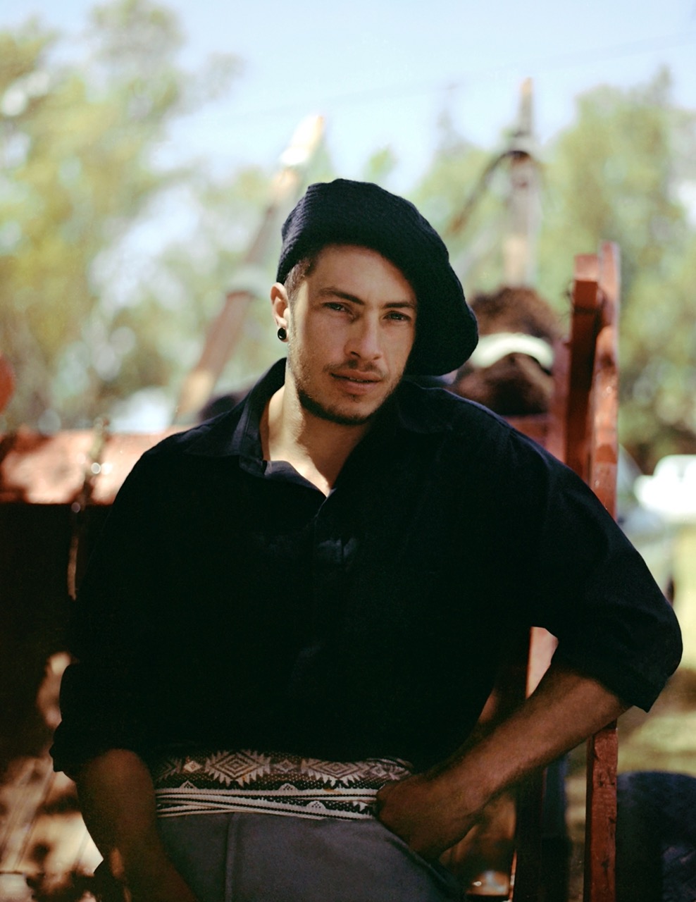 a gaucho in a black shirt and hat