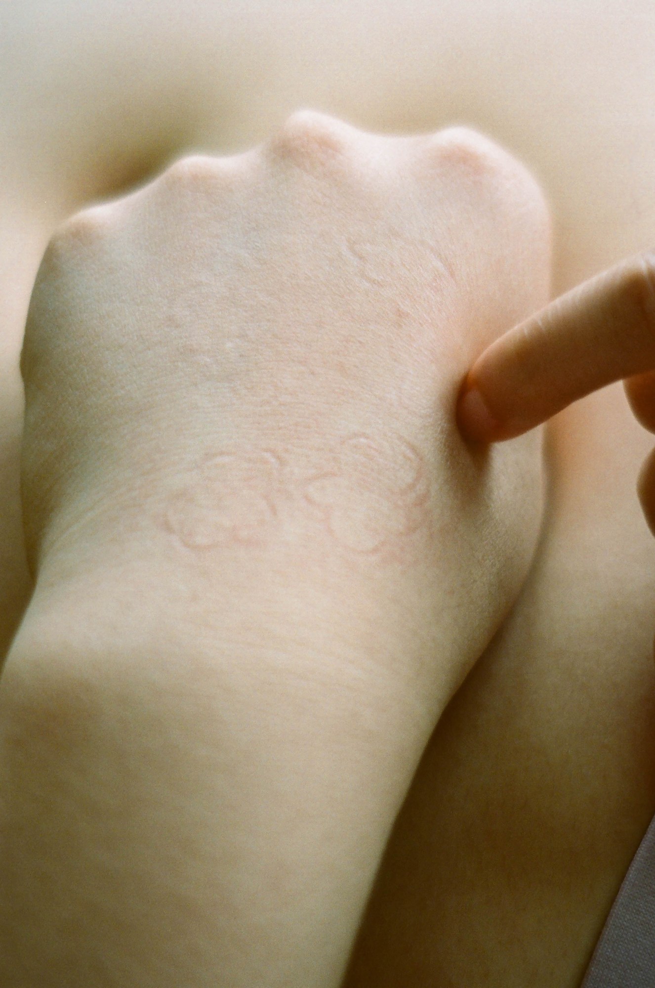 imprint of flower marks on a close up hand