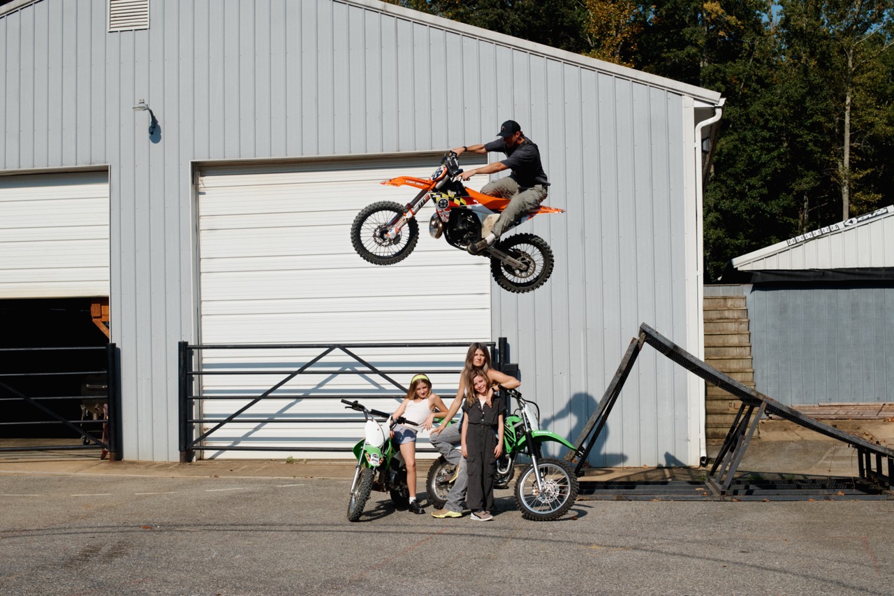 Travis Pastrana and Lyn-z and their family on bikes and wearing Natacha Ramsay-Levi's Ecco collection for the campaign photographed by Sean Thomas