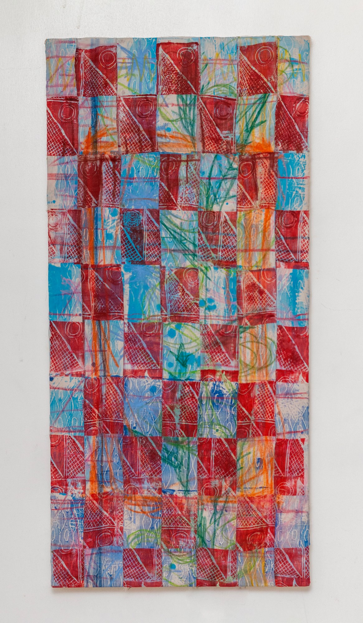 a red, blue and orange patchwork painting by nola ayoola