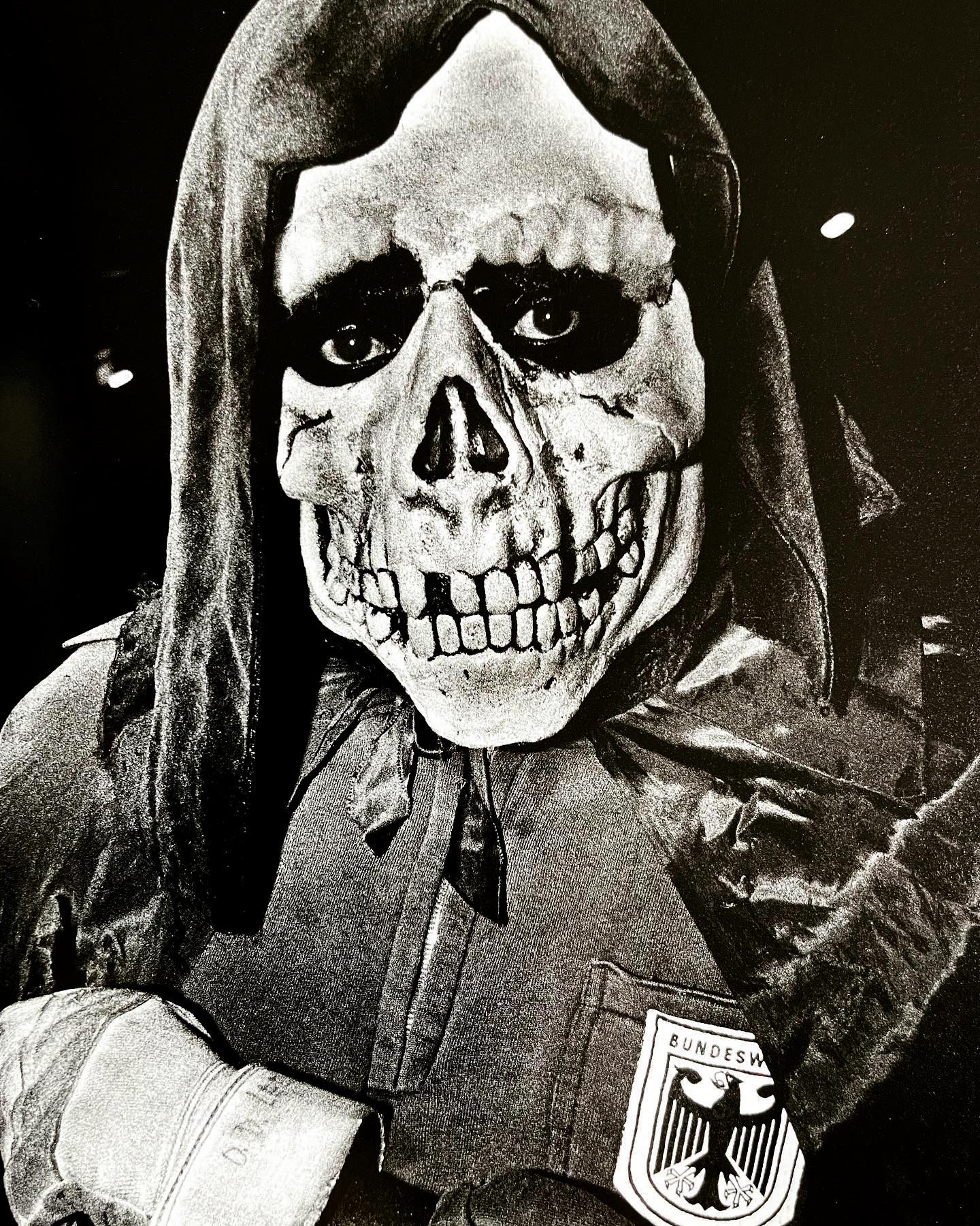 a person in a skeleton mask shot up close