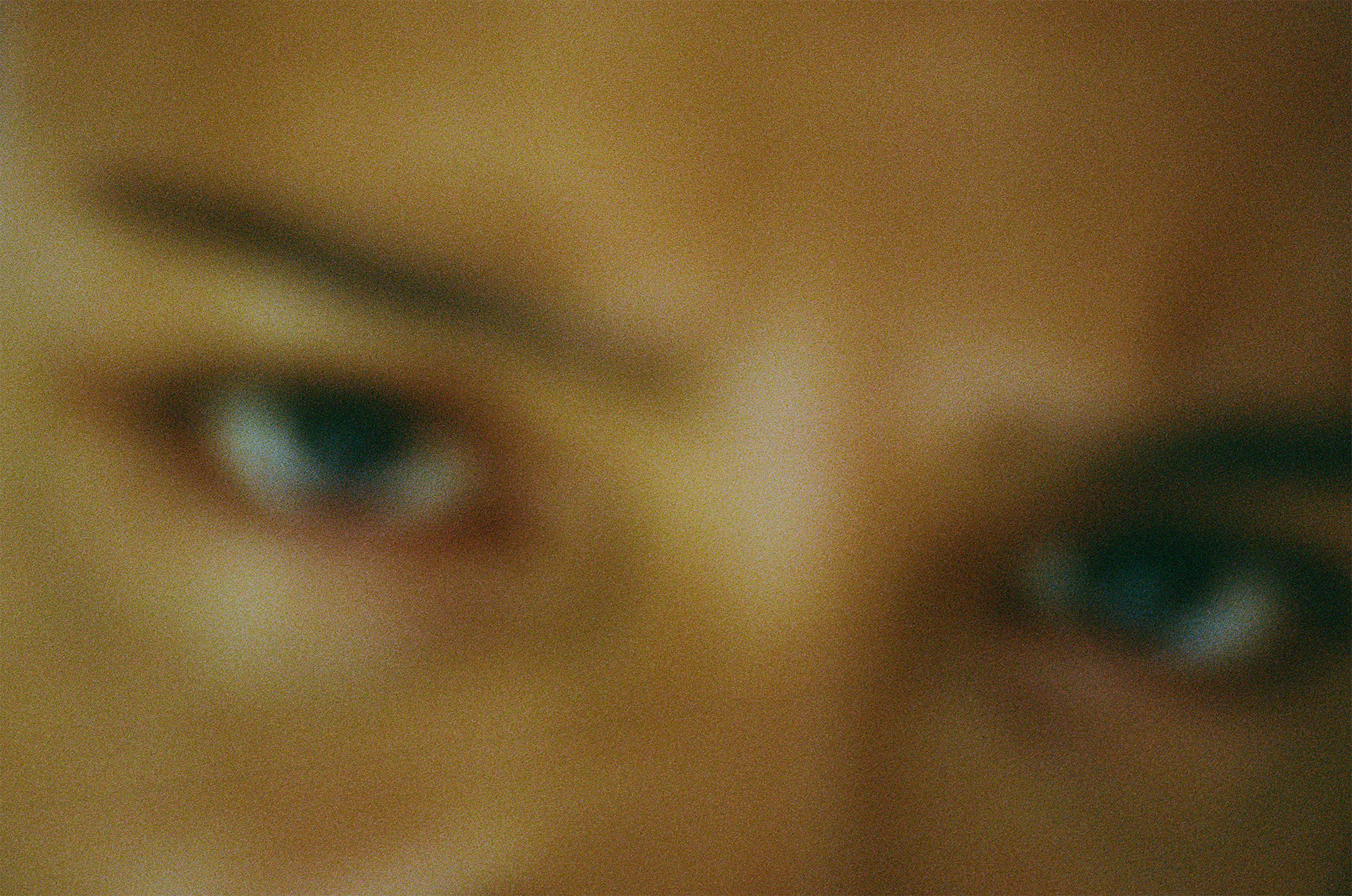 blurry close up of eyes photographed by rene matic