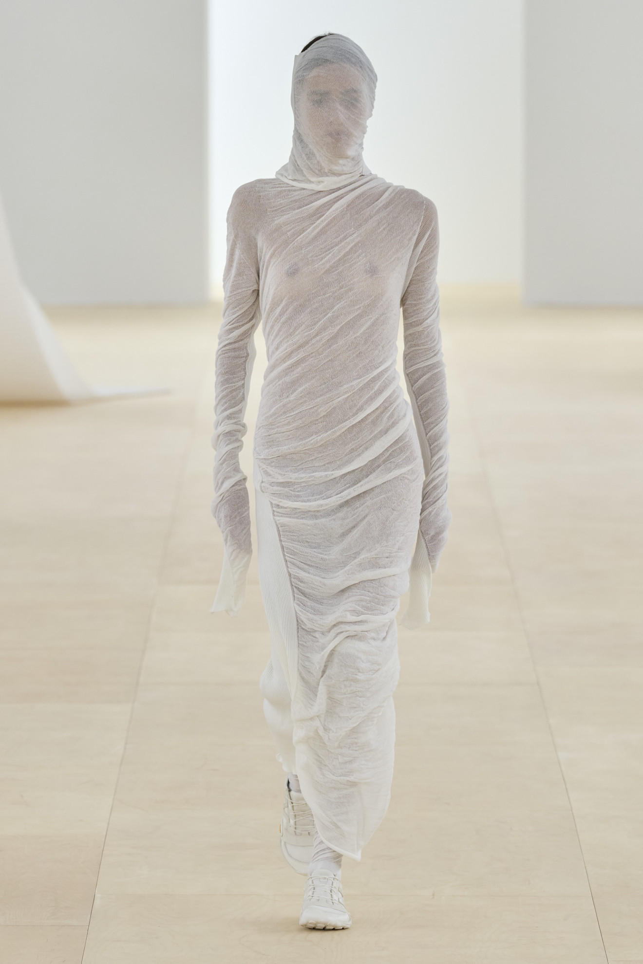 Halloween costume inspiration of a model dressed as a ghost on the Issey Miyake SS24 runway