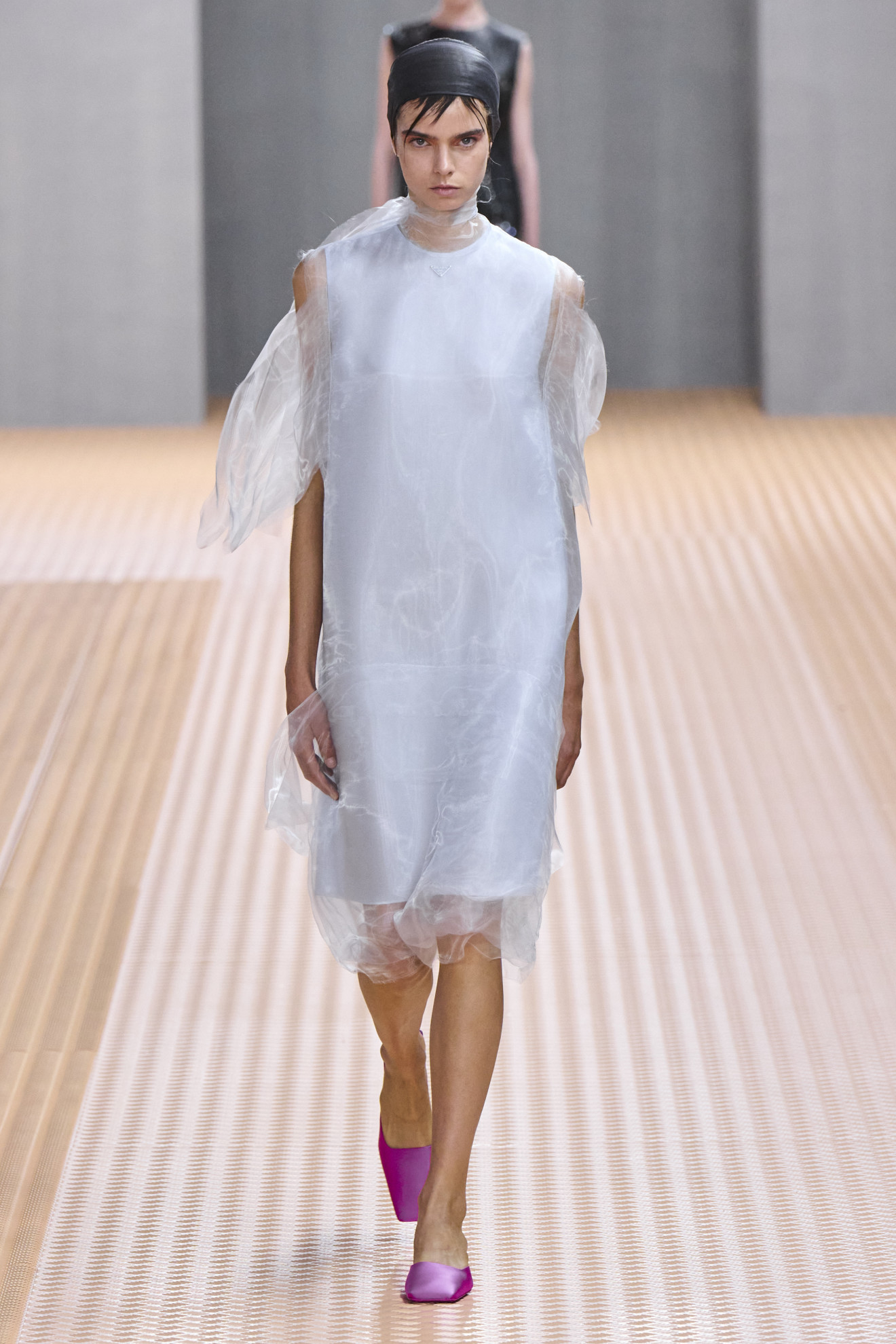 Halloween costume inspiration of a model dressed as a ghost on the Prada SS24 runway