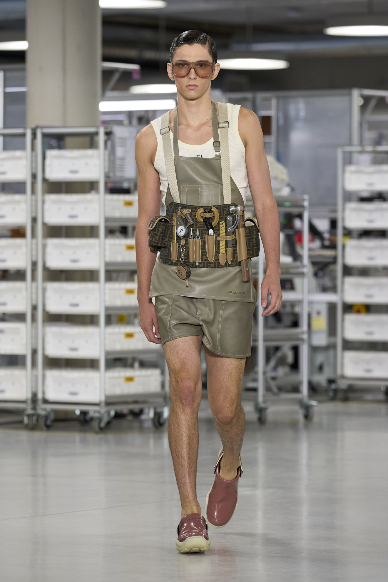 Halloween costume inspiration of a model dressed as a sexy builder on the Fendi SS24 runway