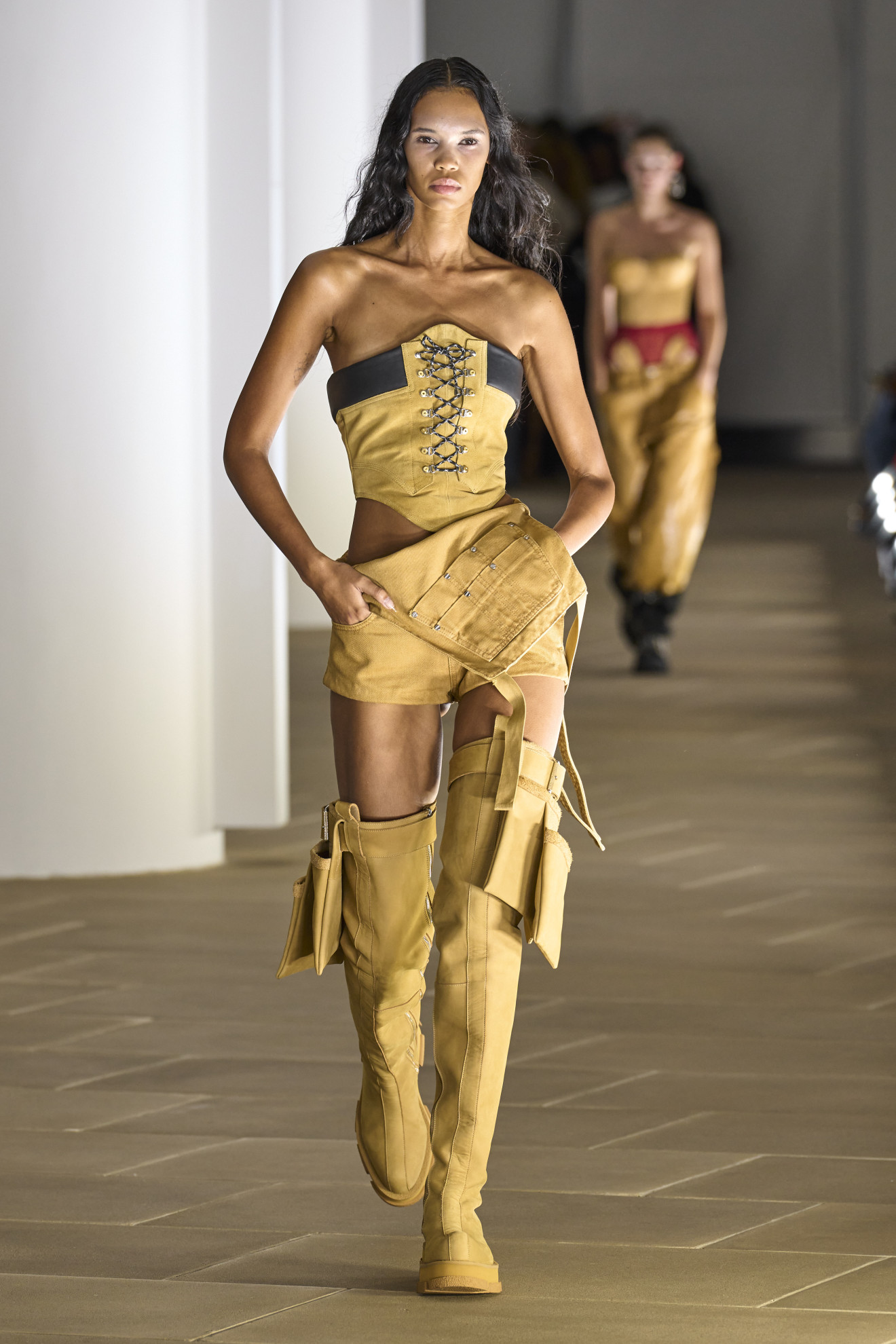 Halloween costume inspiration of a model dressed as a Timberland Boot on the Dion Lee SS24 runway