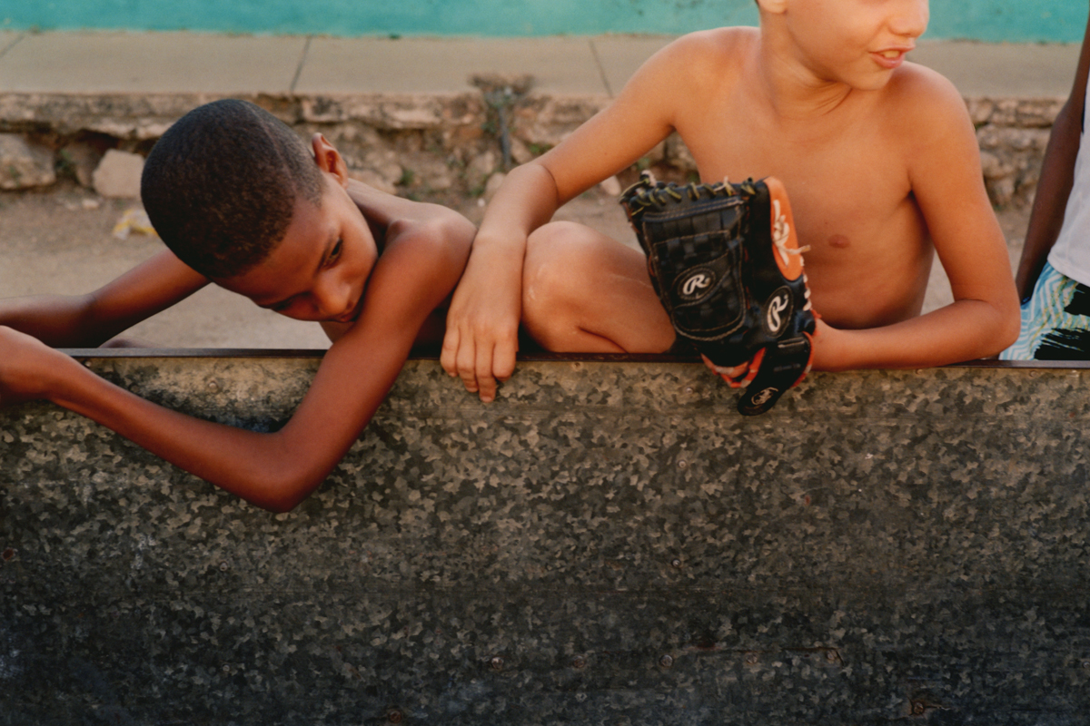 two young boys playing baseball