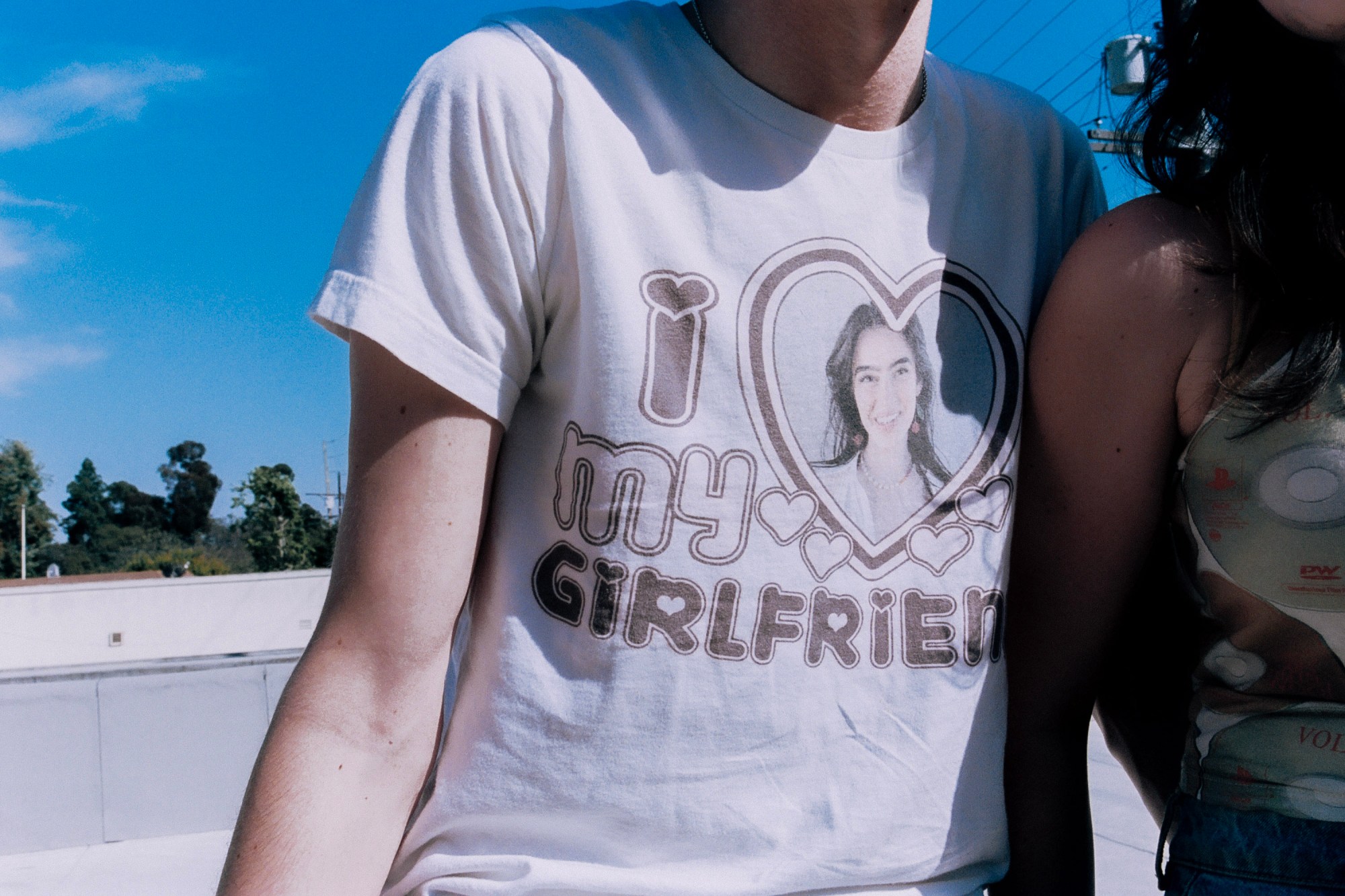 a person wearing a t-shirt that says i love my girlfriend