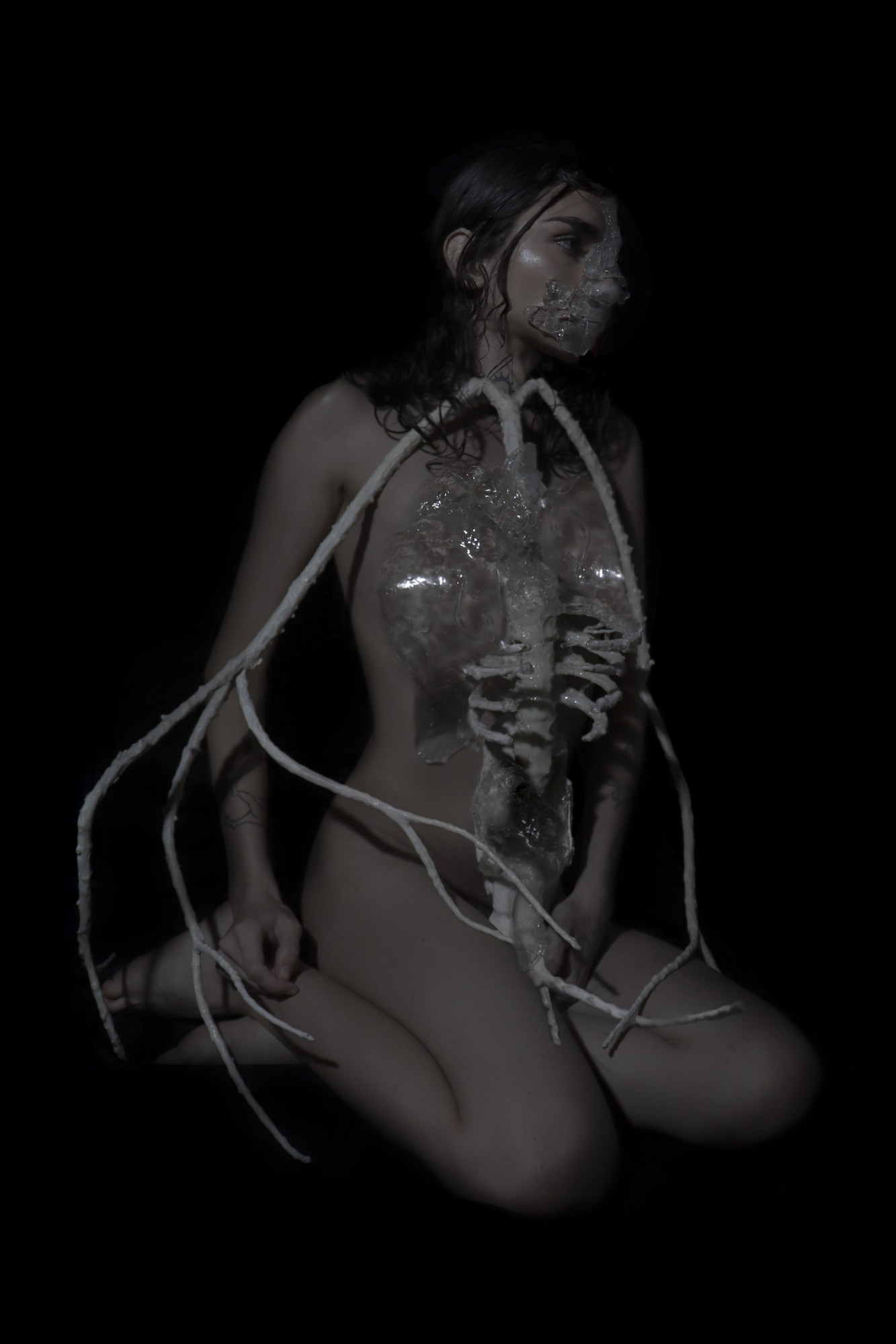 brazilian trans artist aun helden wearing prosthetic rib cage and lungs