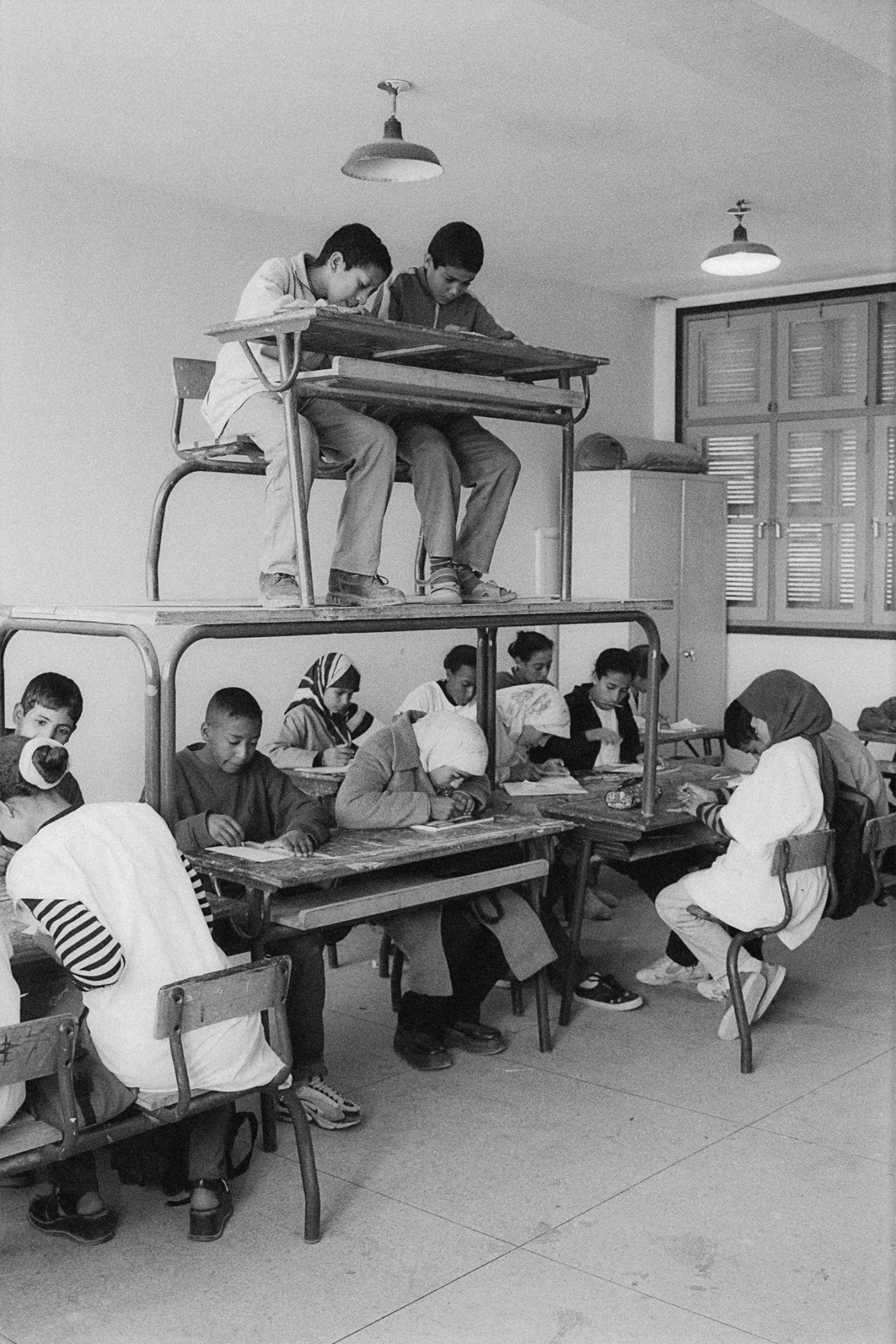 black-and-white photo of students in a classroom