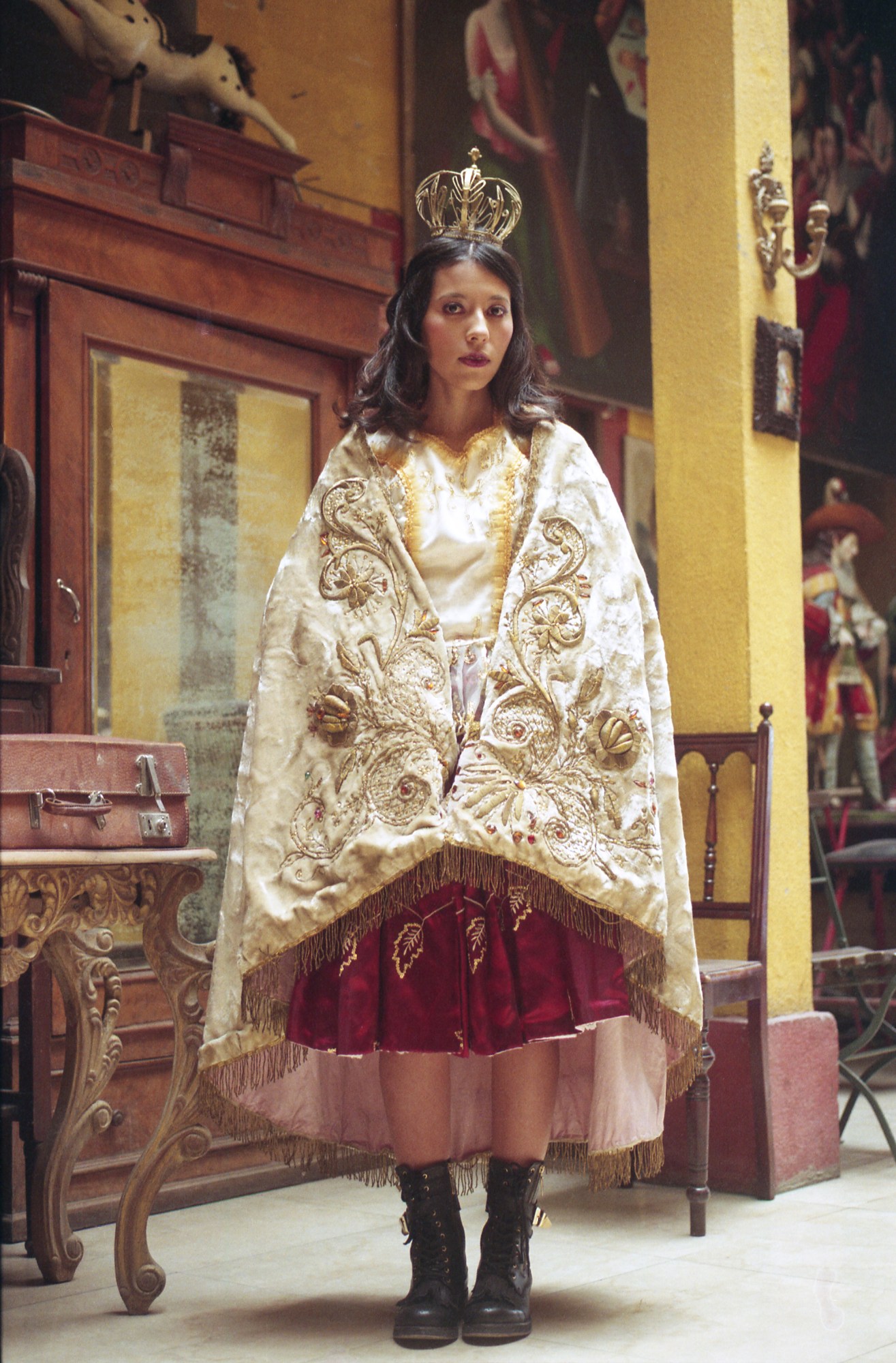 a woman wearing traditional catholic robs in an old church