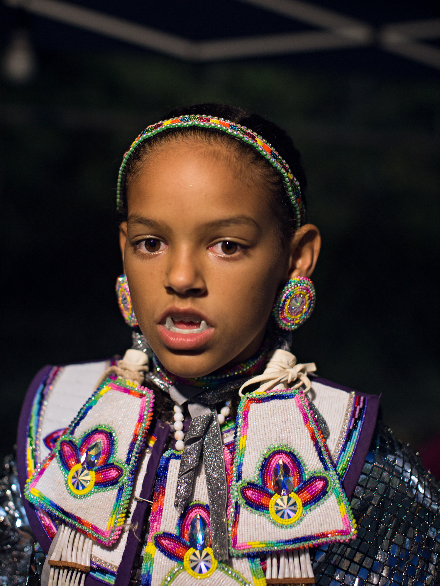 Kearsey wearing native american lumbee dress and vampire teeth in north carolina