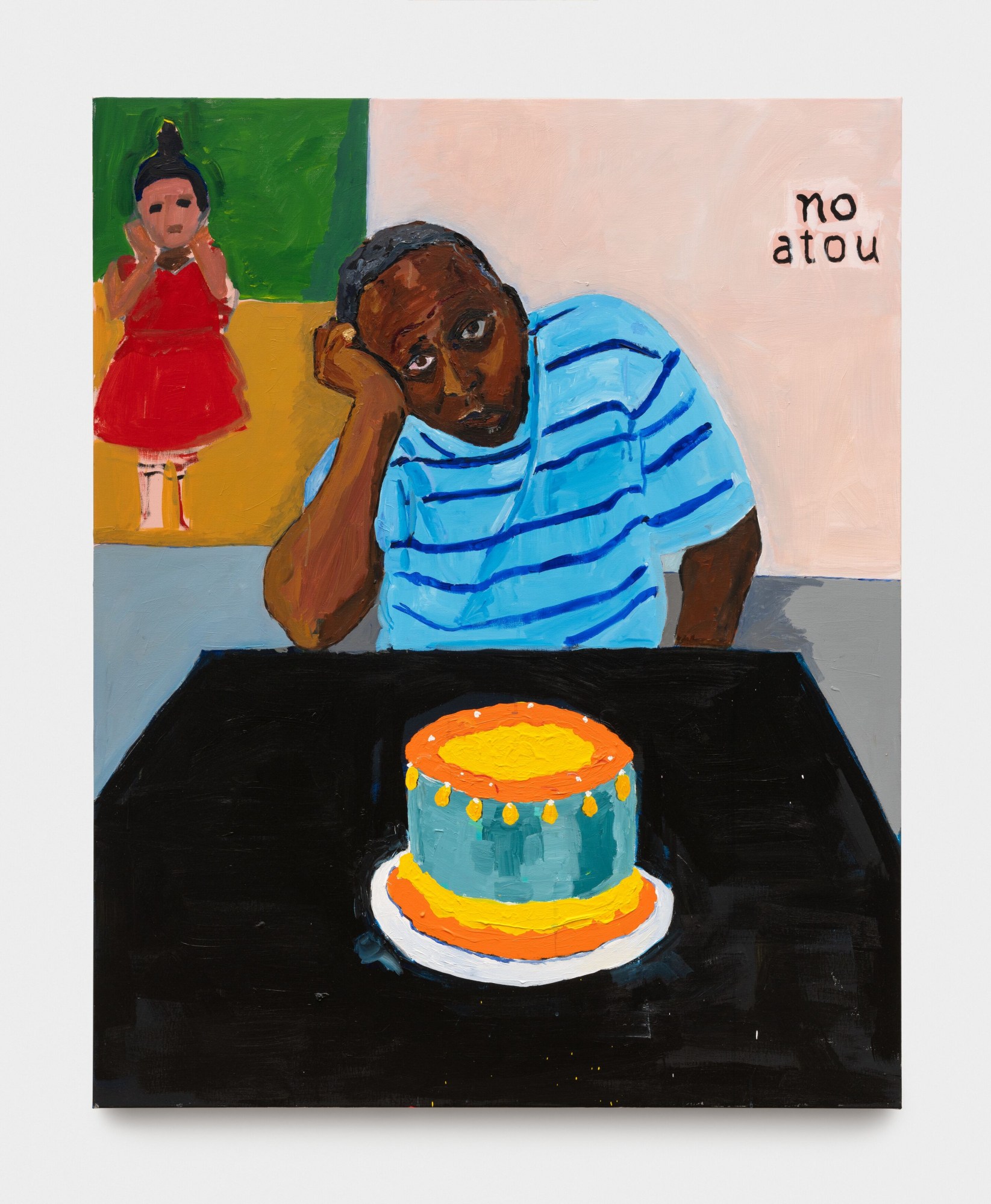 a man sitting at a table with a birthday cake